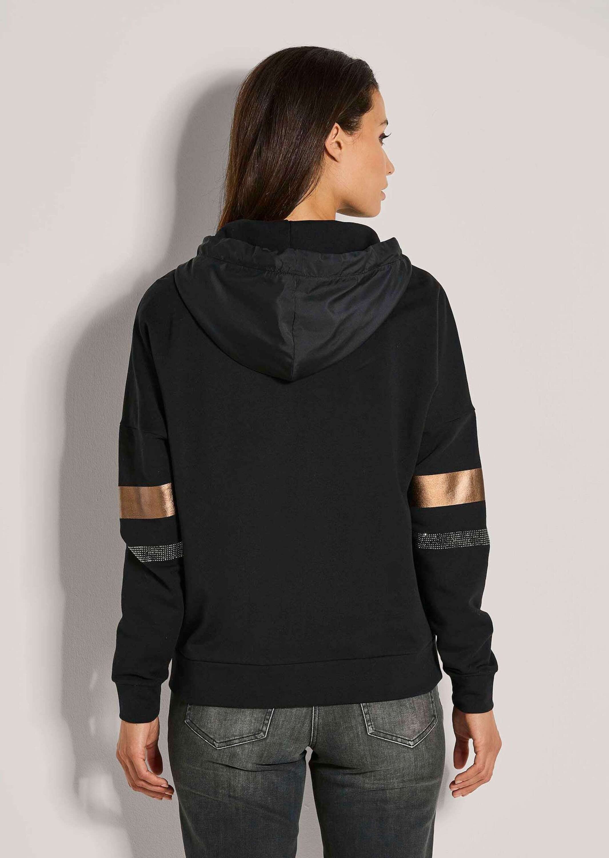 MADELEINE Kurzjacke »Kapuzenjacke Glänzende Oversized-Jacke mit Strass«