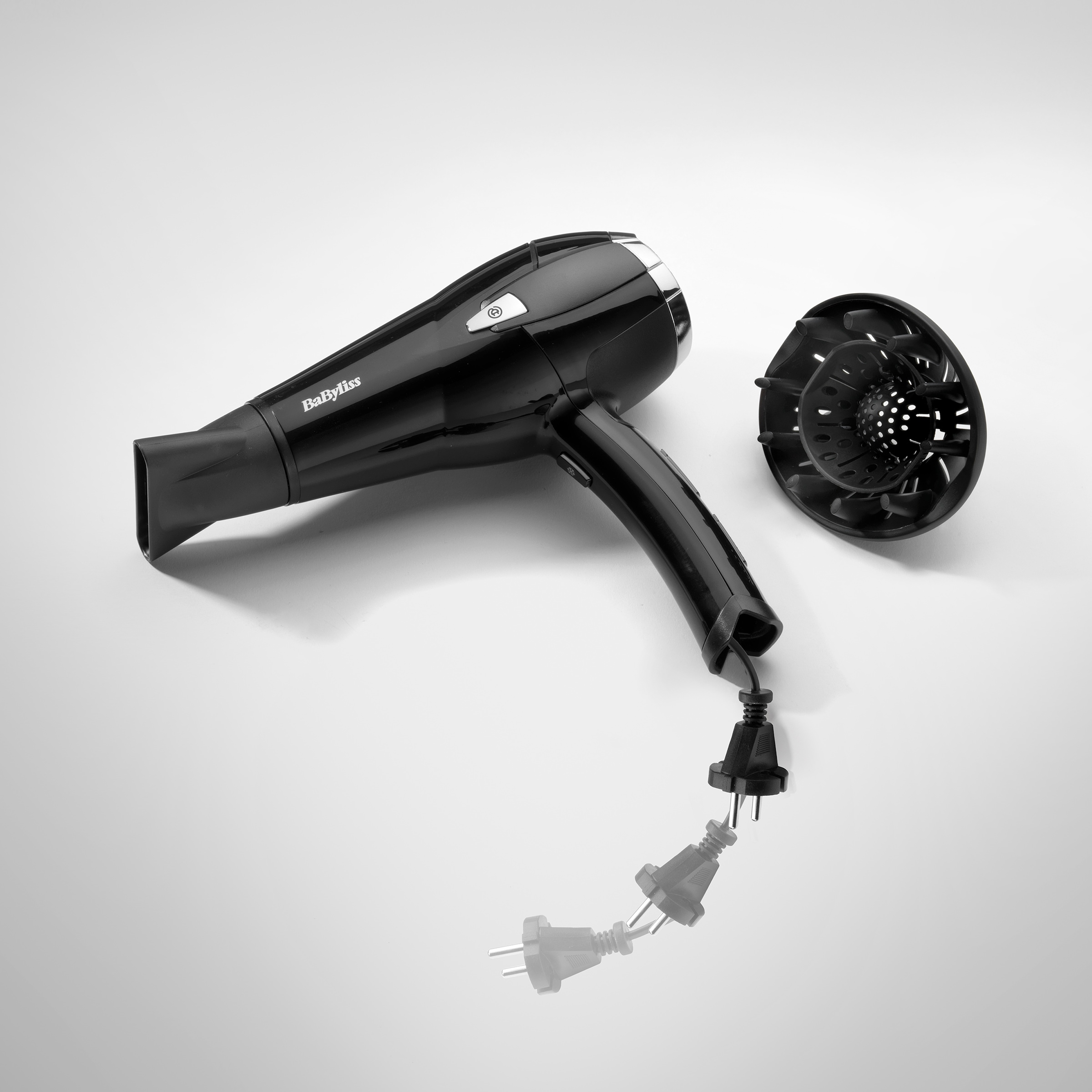 BaByliss Haartrockner »BaByliss CordKeeper 2000 Haartrockner mit Kabeleinzugsfunktion, D374DE« 2.000 W 2000 W Föhn mit Ionen-Technologie, Diffusor, Zentrierdüse & 3 Stufen