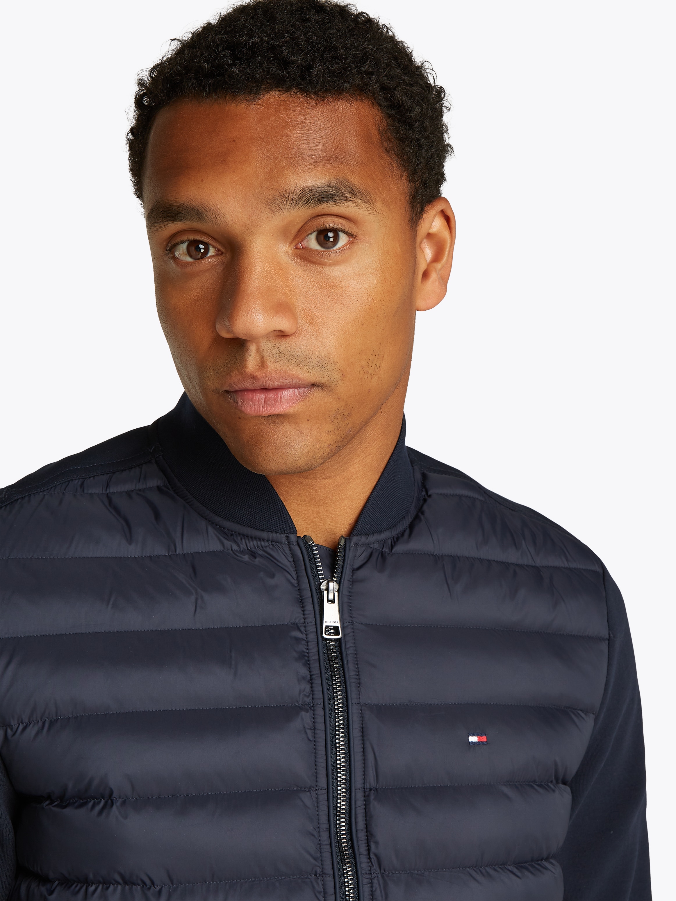 Tommy Hilfiger Sweatjacke »MIX MEDIA BOMBER«, mit gesteppten Einsatz