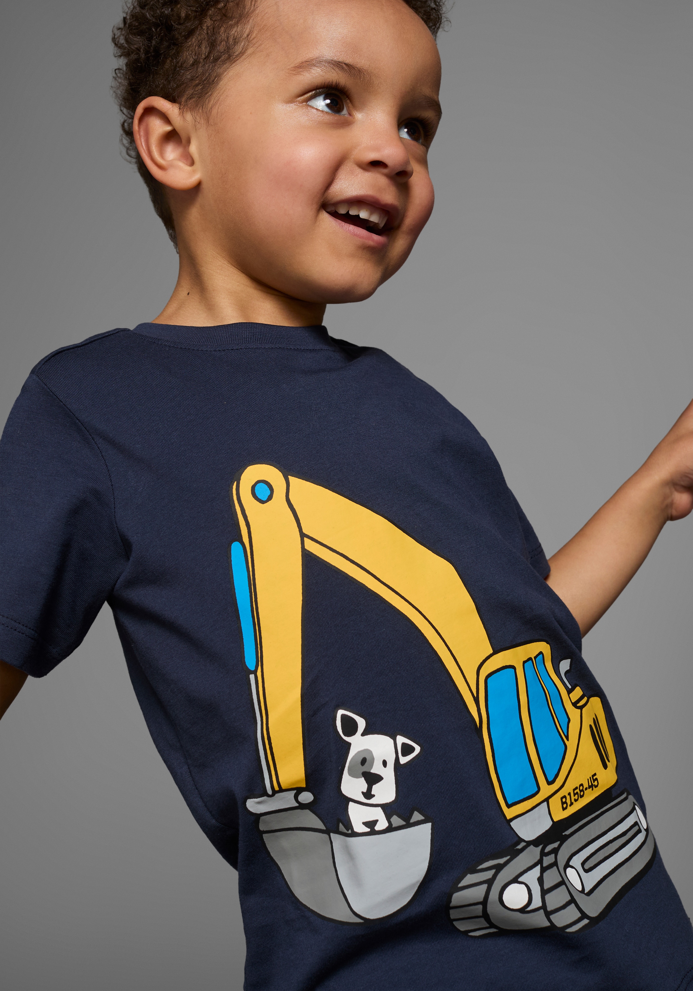 KIDSWORLD T-Shirt, Kurzarm, Basic-Passform, mit stylischem Druck, mit Rippbündchen