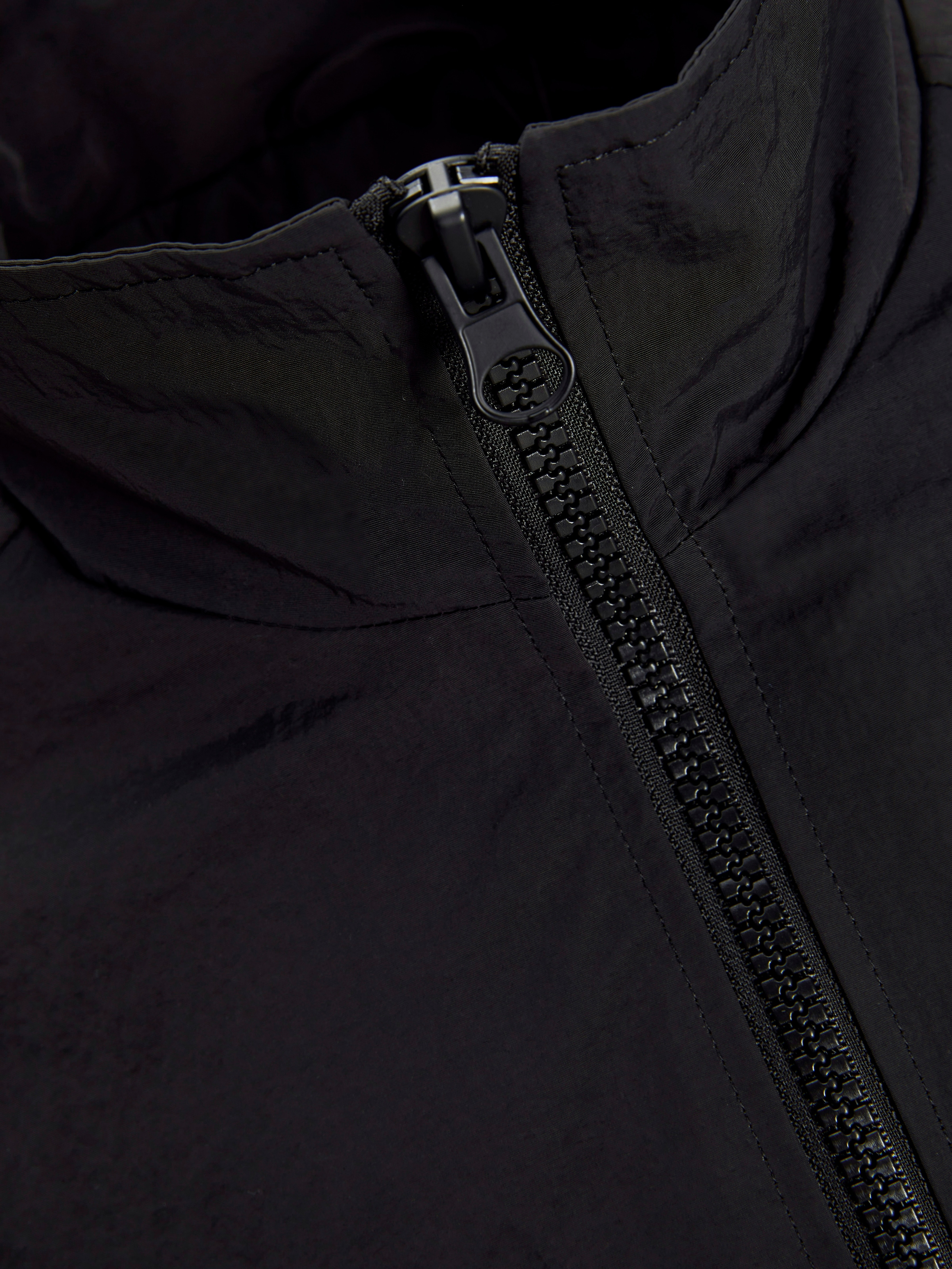 Jack & Jones Outdoorjacke »JCOUNION TRACK JACKET SN«, ohne Kapuze, Mit stylischem Print