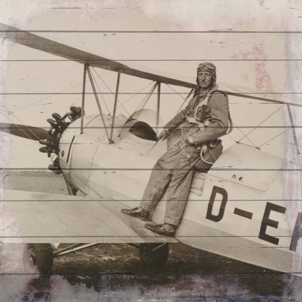 queence Holzbild »Altes Flugzeug mit Pilot«