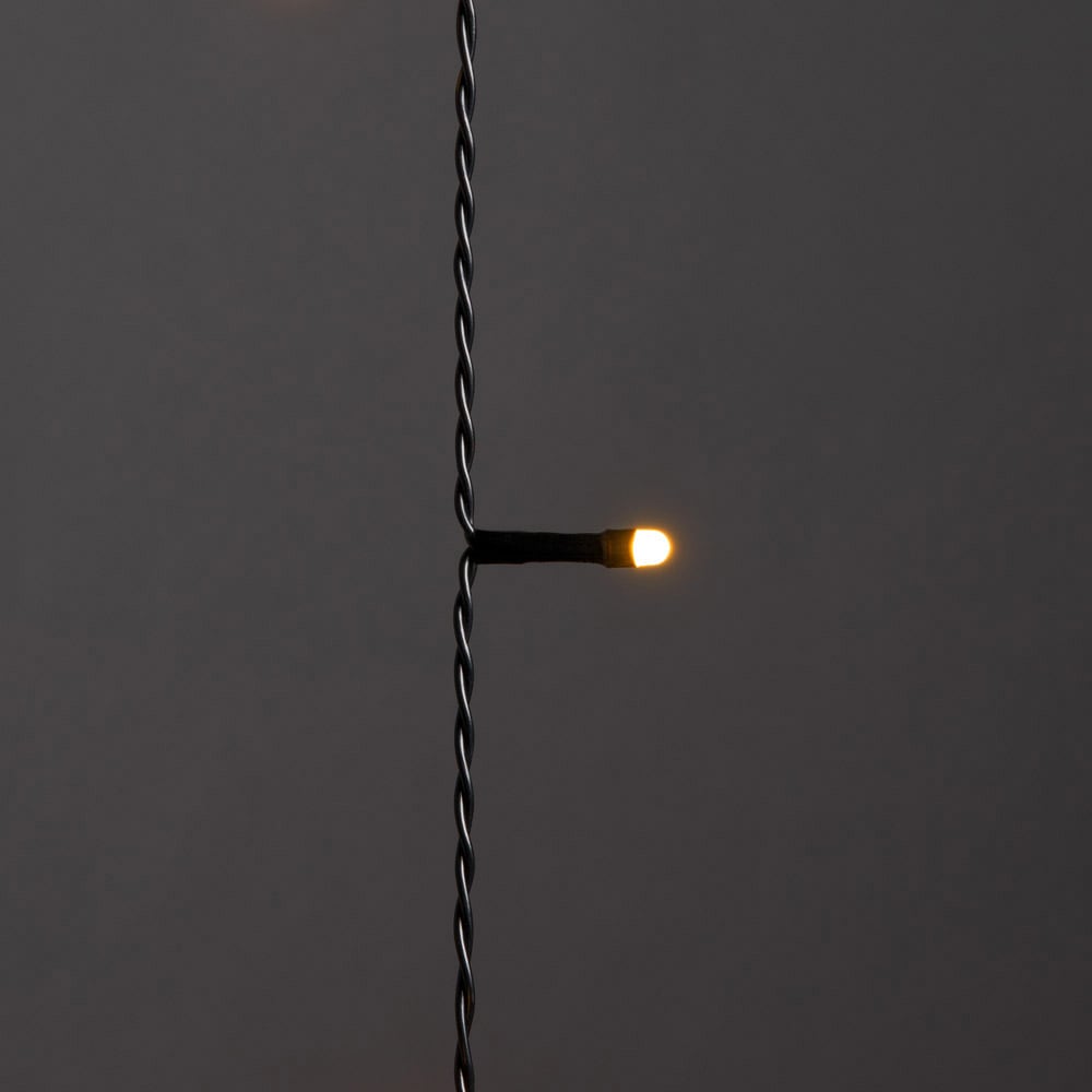 KONSTSMIDE LED-Baummantel »Weihnachtsdeko aussen, Christbaumschmuck, 8h Timer, vormontiert«, Ring Ø 17, 8 Stränge à 70 bernsteinfarbene Dioden, mit Glimmereffekt