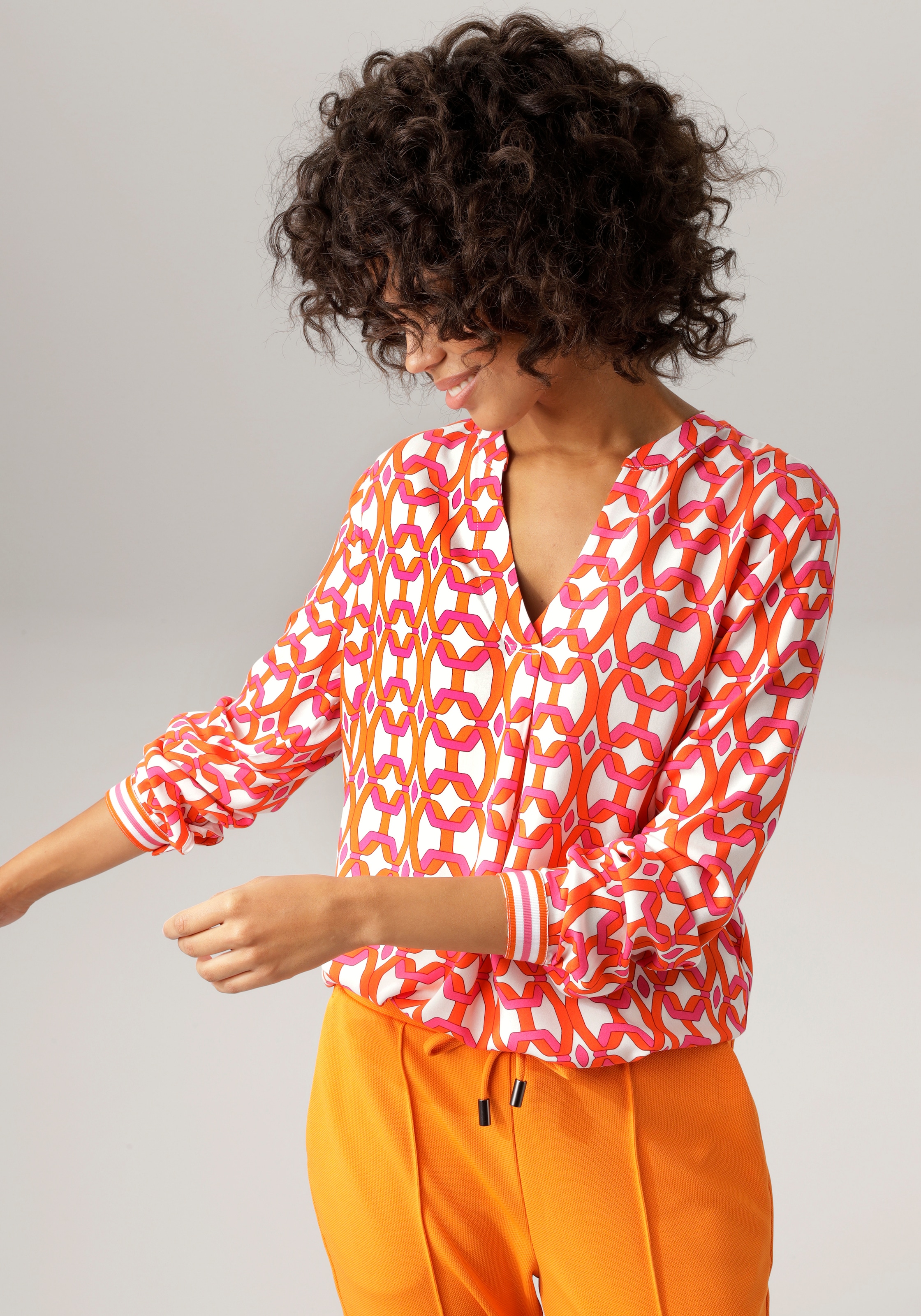 Aniston CASUAL Schlupfbluse, mit extravagantem, graphischem Druck