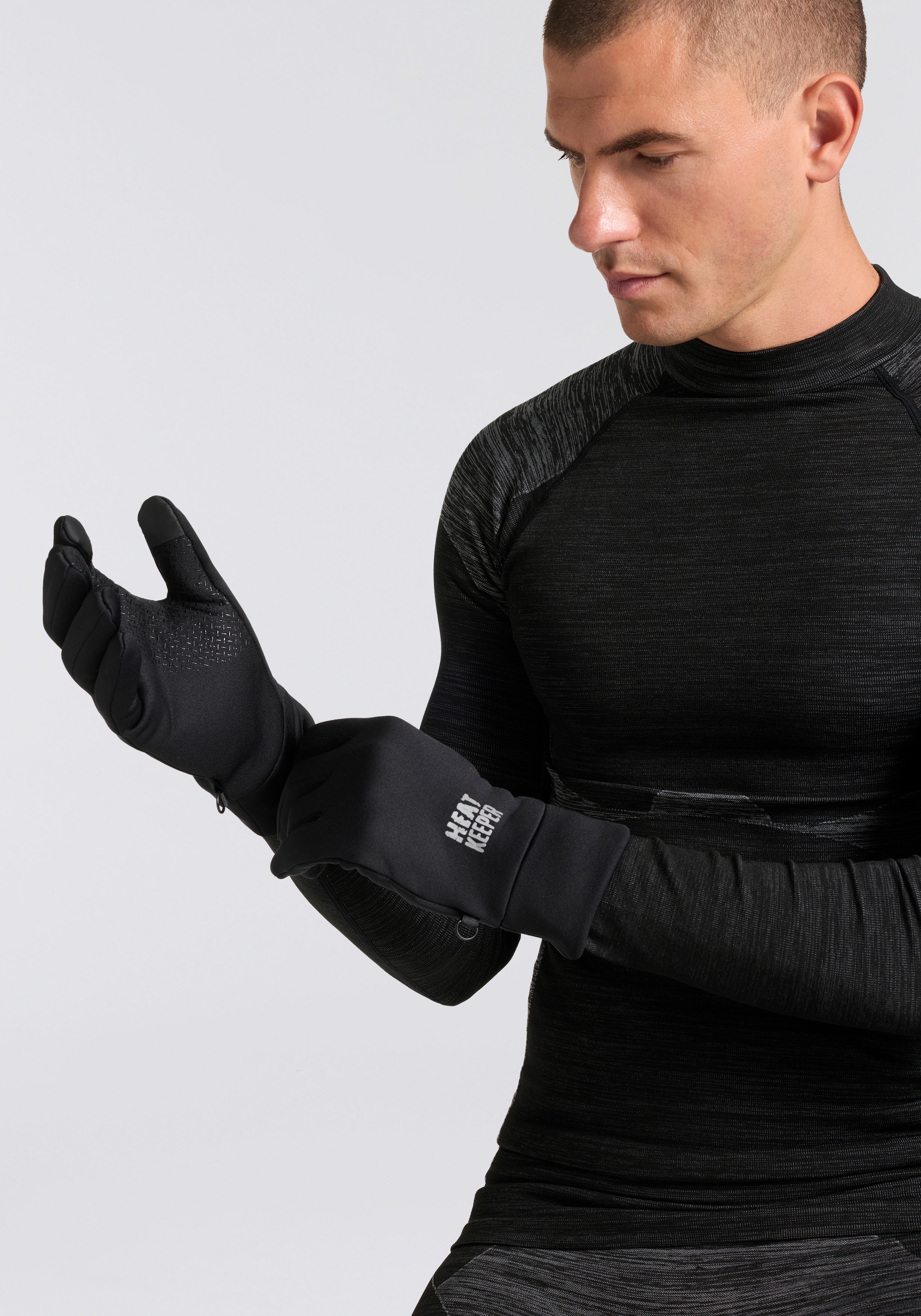 Heatkeeper Fleecehandschuhe mit Silikon-Finish an der Handfläche und I-Touch-Profile an Daumen