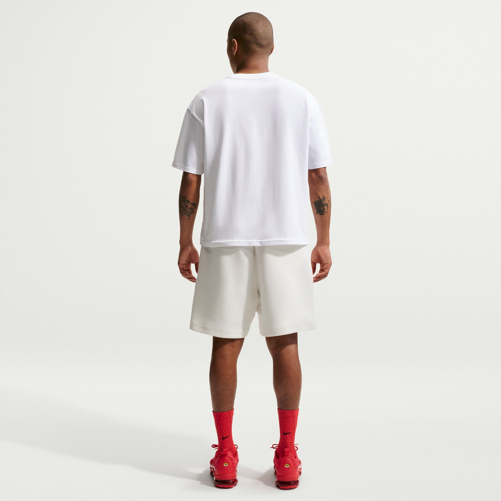 Nike Sportswear T-Shirt »M NSW TEE LSE BOXY FOOTBALL« aus Baumwolle, auch in großen Größen