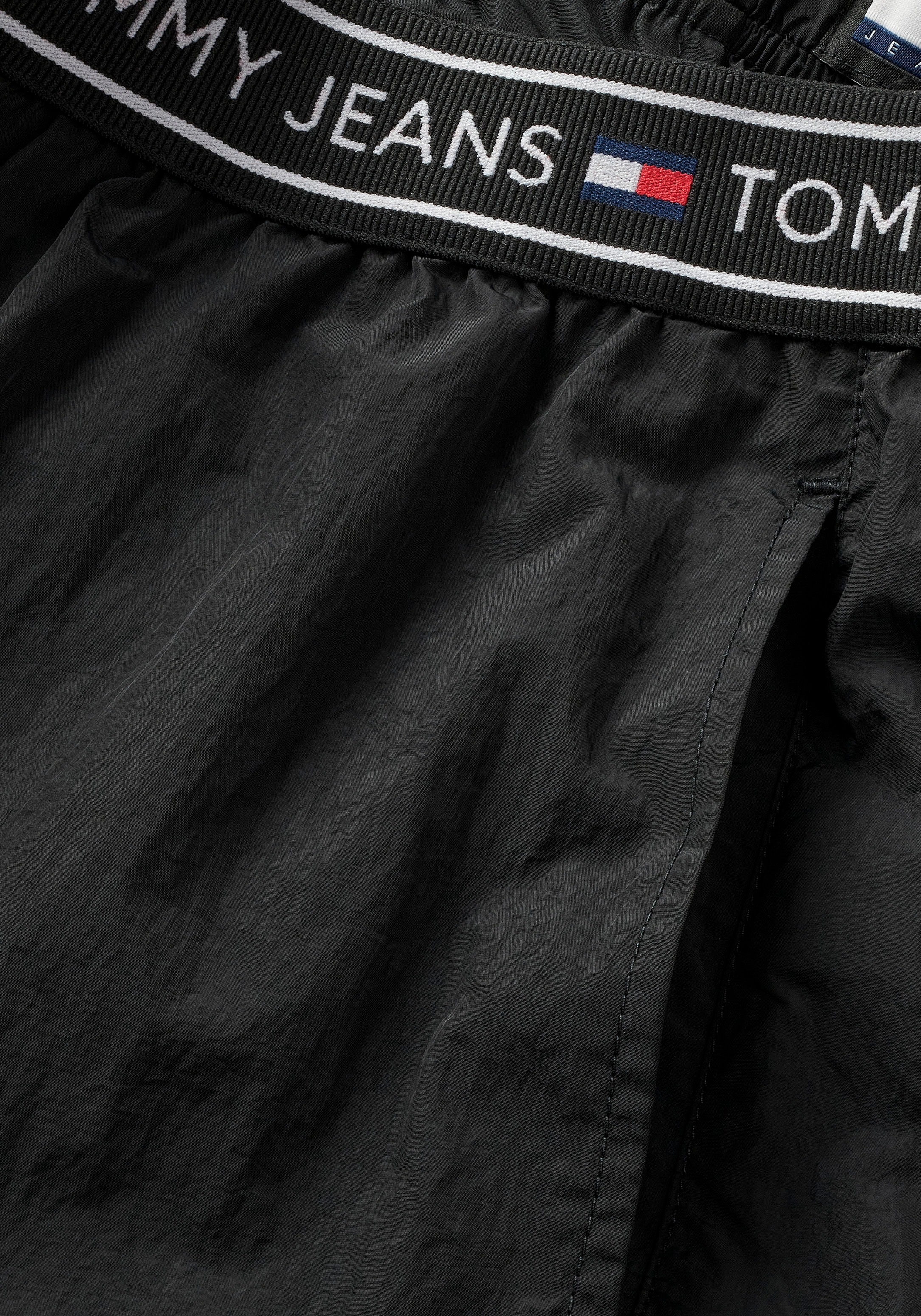 Tommy Jeans Webhose »TJW BAGGY TAPING TRACKPANT EXT«, mit Logoprägung