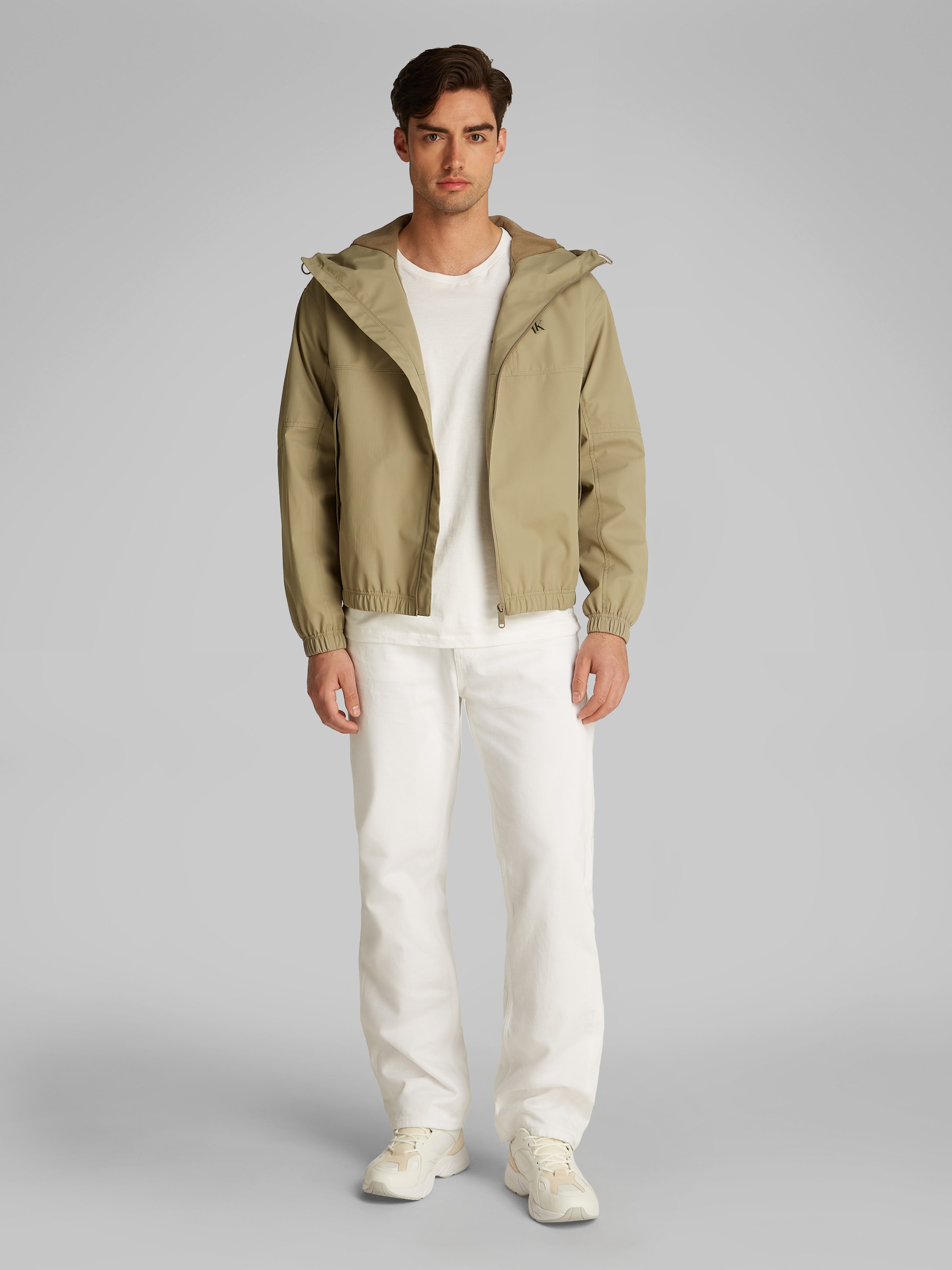 Calvin Klein Jeans Allwetterjacke »TECHNICAL JACKET«, mit Kapuze, Logodruck, Eingriffstaschen