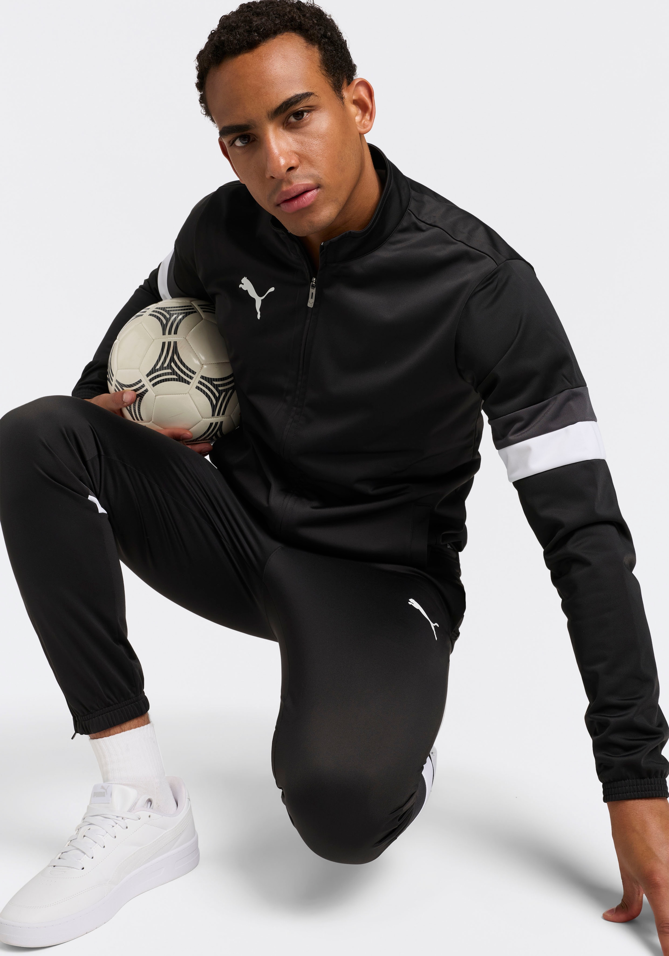 PUMA Trainingsanzug »TEAMRISE TRACKSUIT« 2 zweiteiliges Set, Regular Fit, ohne Kapuze
