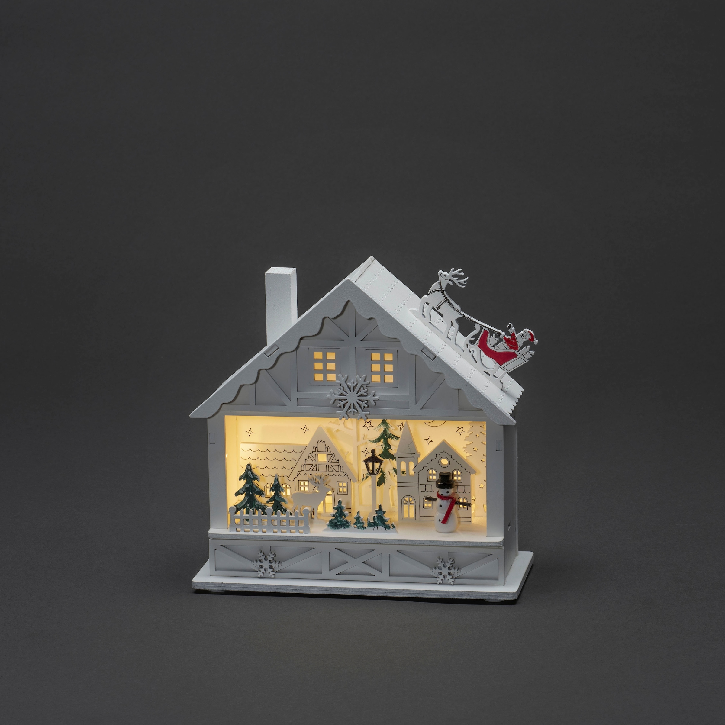 KONSTSMIDE Weihnachtshaus »LED Holzsilhouette Haus, weiß, 4 warmweiße Dioden, batteriebetrieben«, 6h Timer