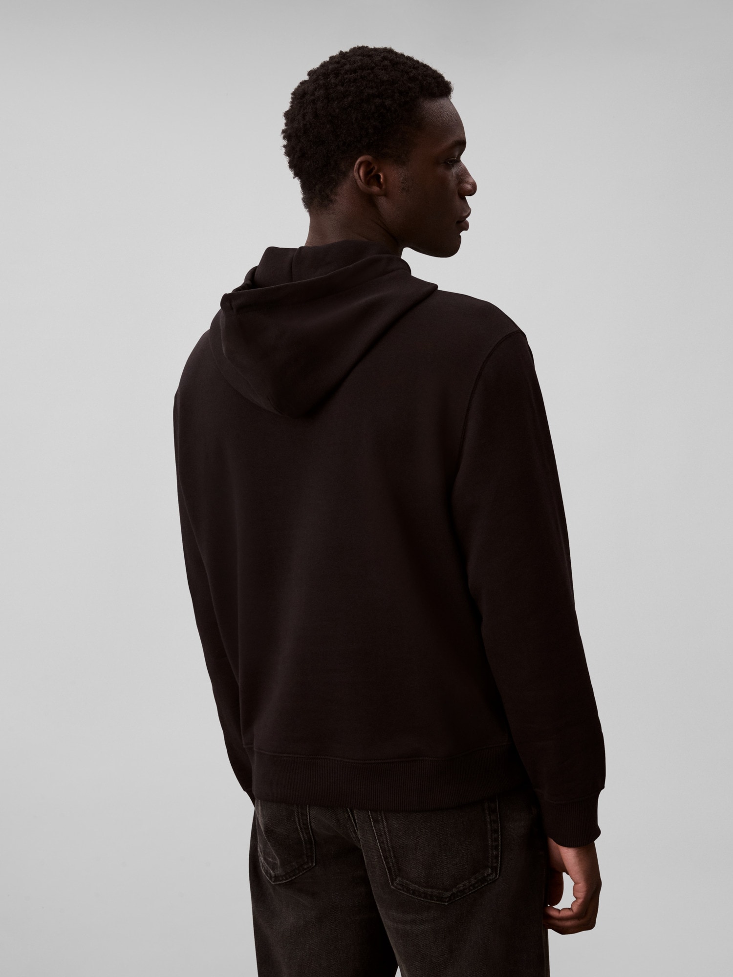 Calvin Klein Kapuzensweatshirt »LS EU 350TERRY CURSIVE GRAPHIC H«, regular fit, Logo-Schriftzug