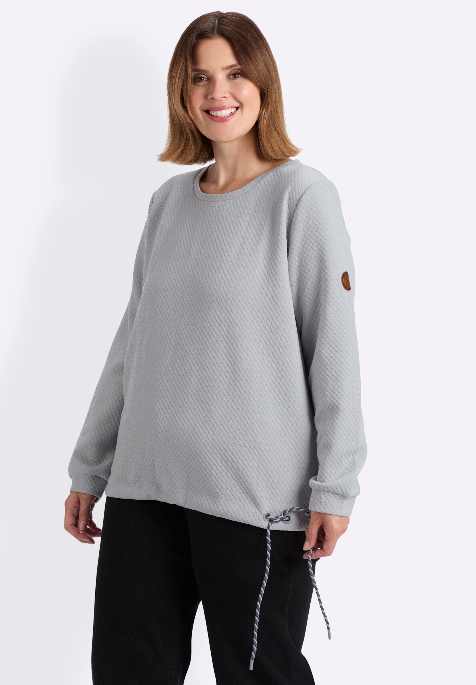 Sheego Sweatshirt »Sweatshirt Sweatshirt mit Ösen und gedrehtem Garn«

