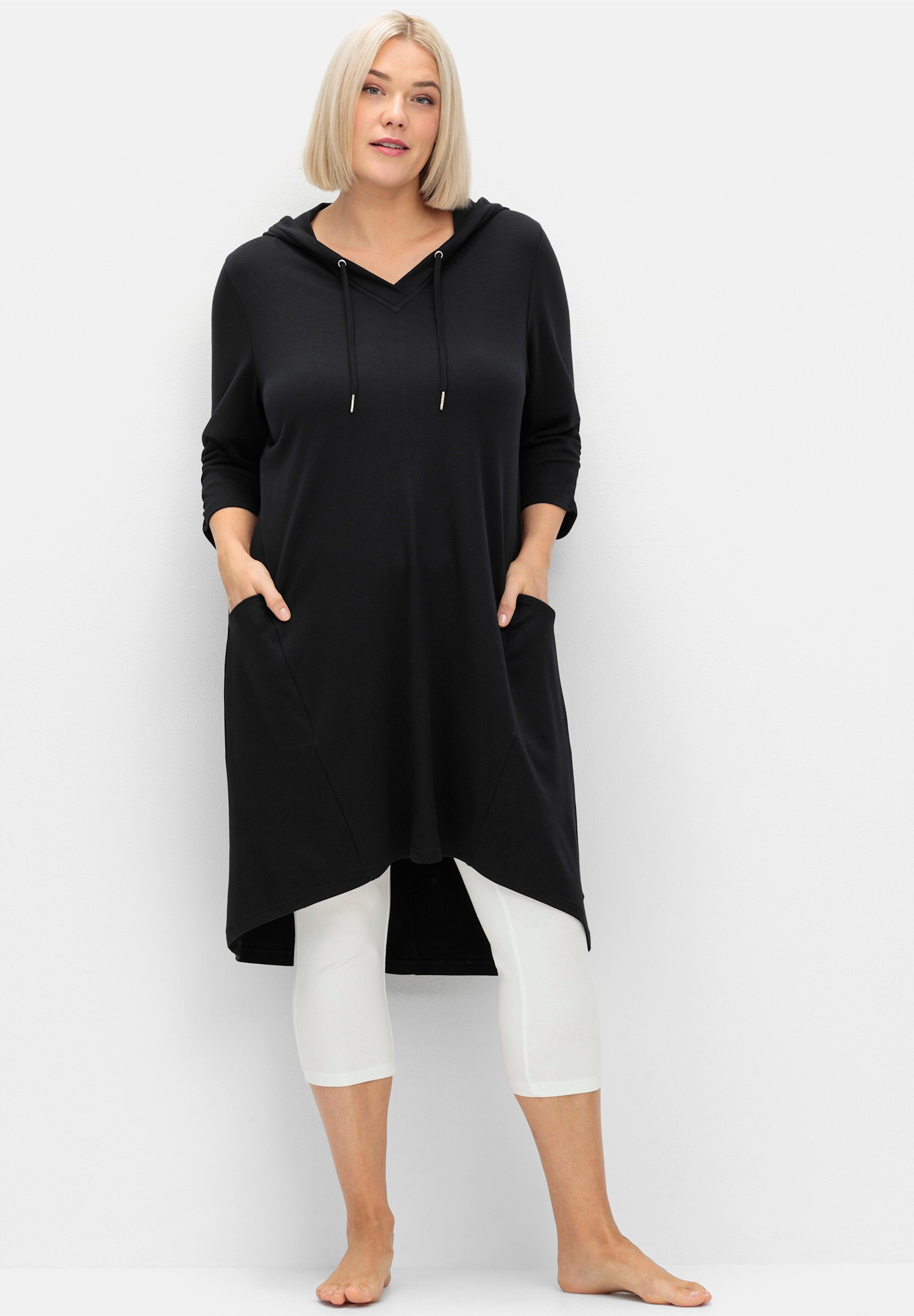 Sheego Shirtkleid »Shirtkleid Shirtkleid mit Kapuze« mit Vokuhila-Saum, aus Interlock