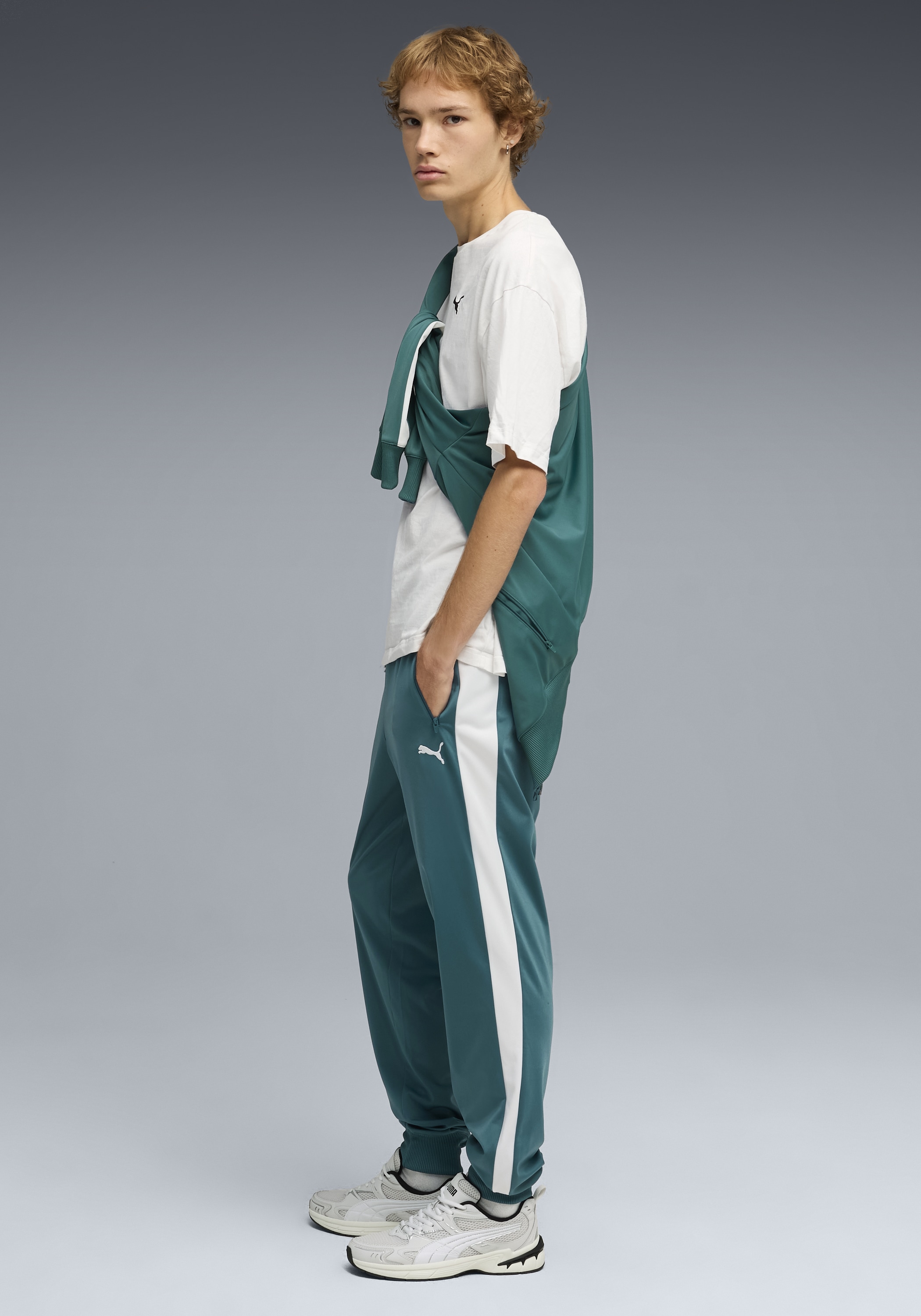 PUMA Trainingshose »T7 FOUNDATION CL POLY KNITTED PANTS«  mit Eingrifftaschen, Regular Fit, sportlicher Stil