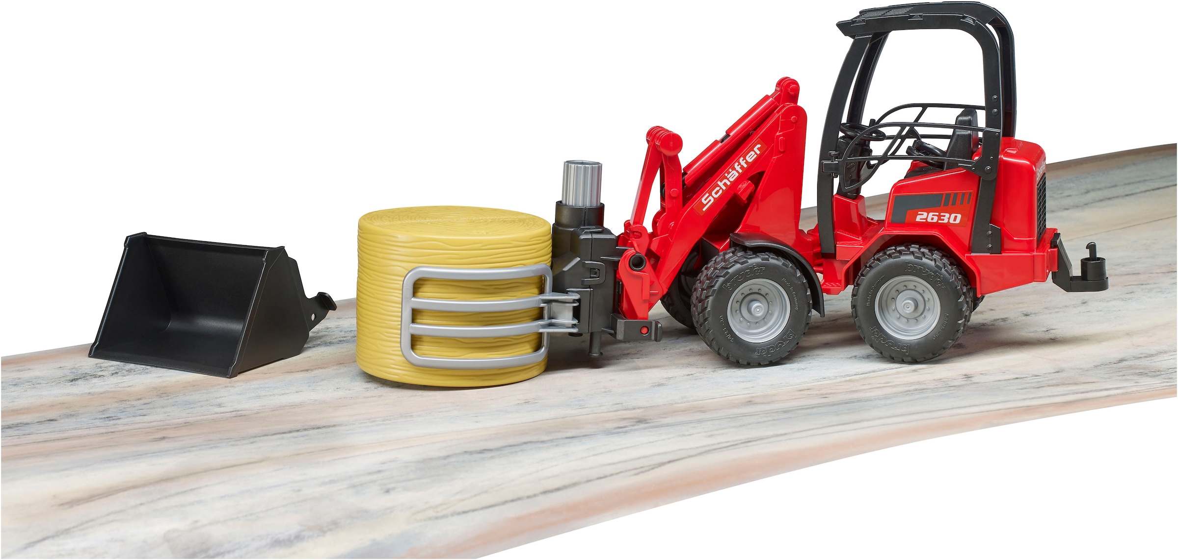 Bruder® Spielzeug-Landmaschine »Schäffer Hoflader 2630/Ballengreifzange/Rundballen (02192)« Made in Europe