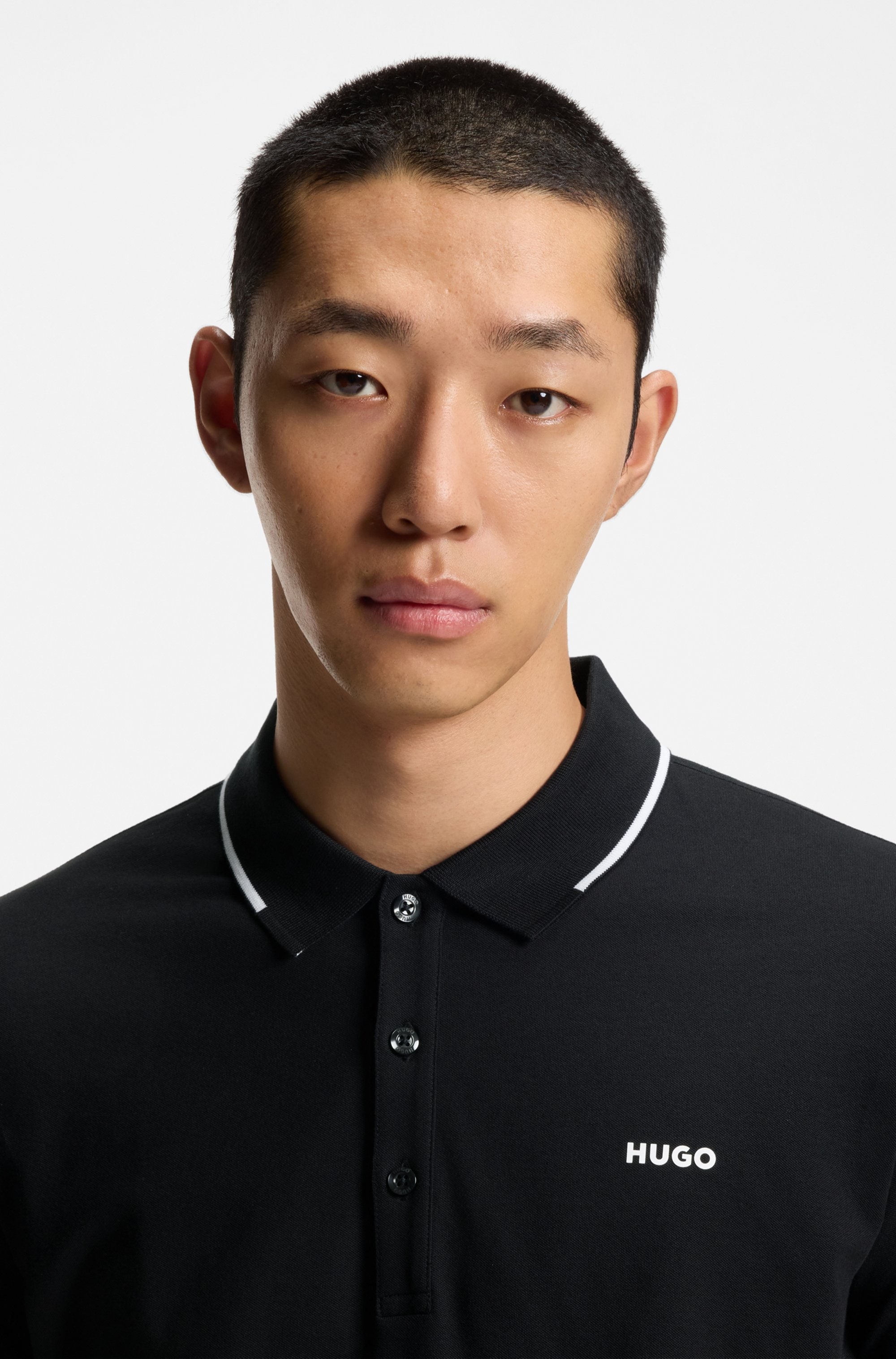 HUGO Poloshirt »Dinoso« Kragen mit kontrastfarbigem Streifen, Slim Fit, Logodruck