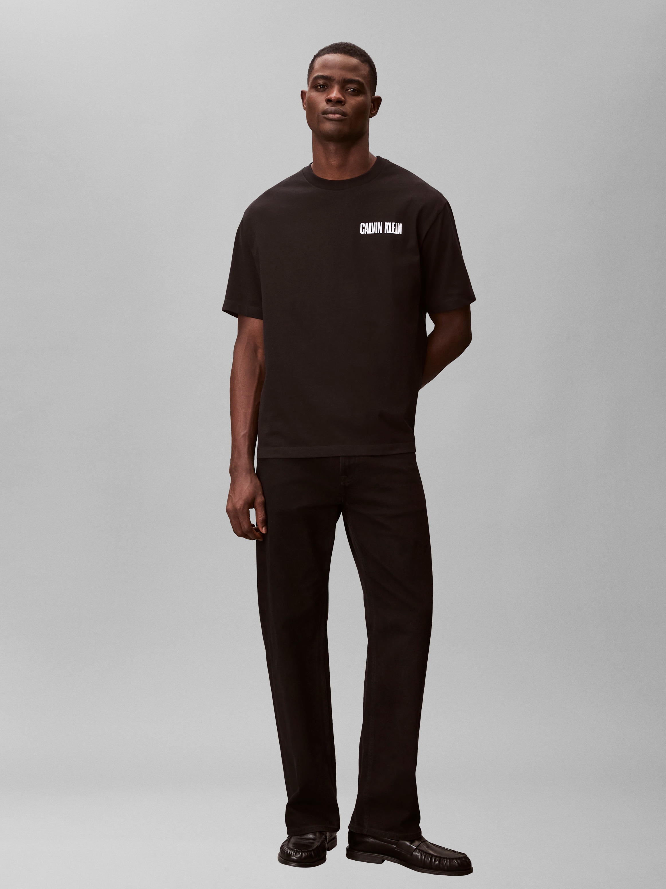 Calvin Klein Jeans T-Shirt »VERT LOGO GRAPHIC CREW« Regular fit mit Markenprint