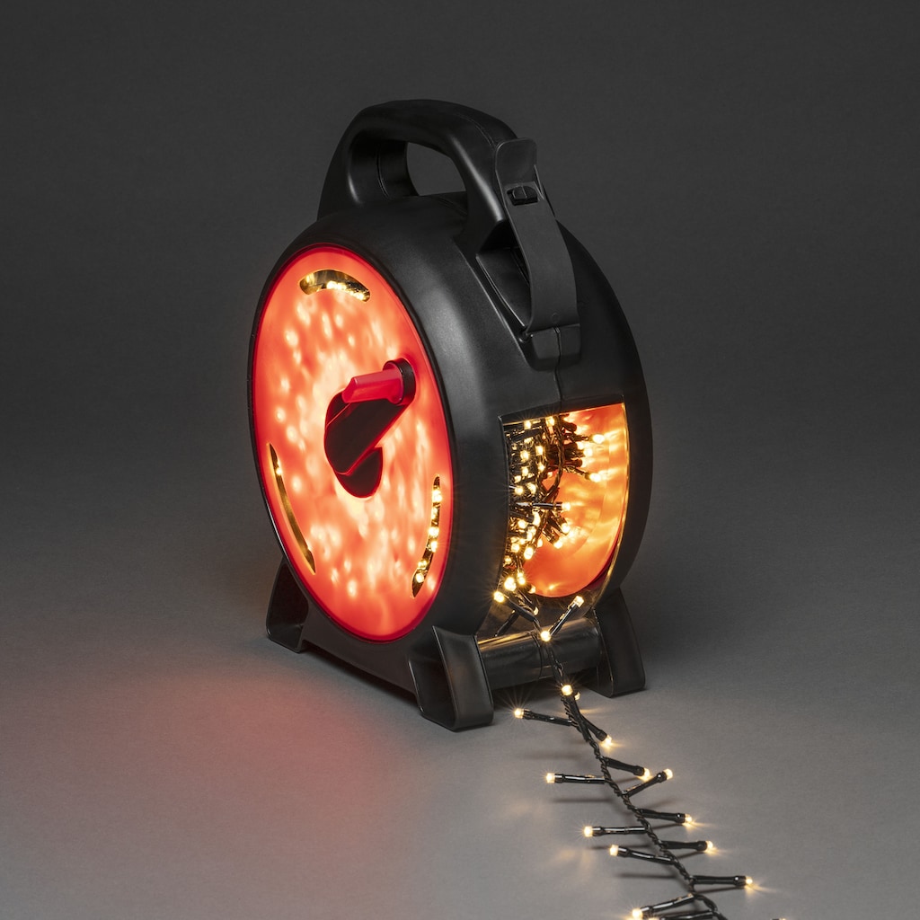 KONSTSMIDE LED-Lichterkette »Weihnachtsdeko aussen«, 800 St.-flammig, Micro LED Compactlights mit Kabelaufroller, schwarz-rot, 800 Dioden