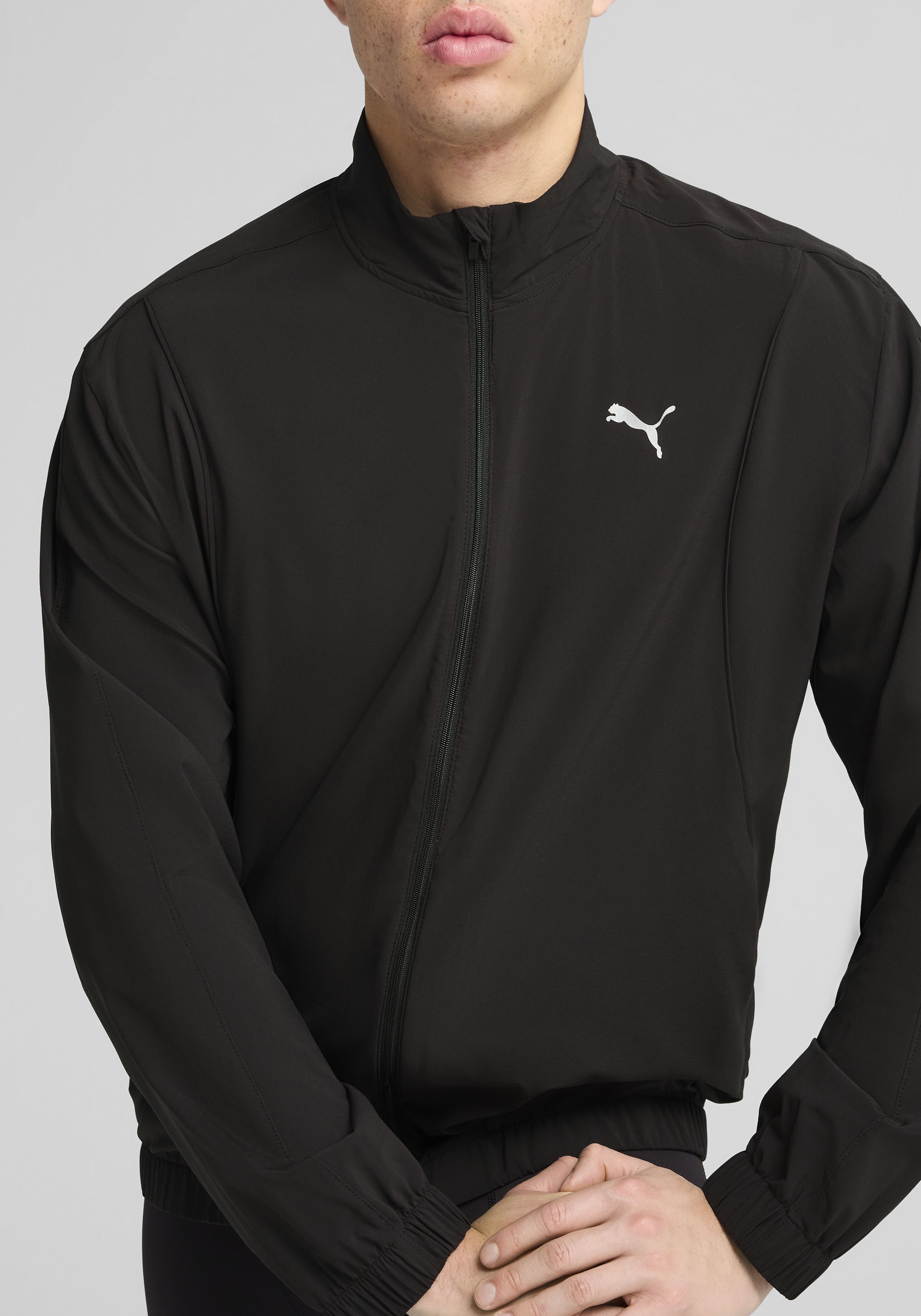 PUMA Trainingsjacke »RUN VELOCITY WOVEN JACKET« ohne Kapuze mit Nahttaschen, mit Reißverschluss und Schutzleiste