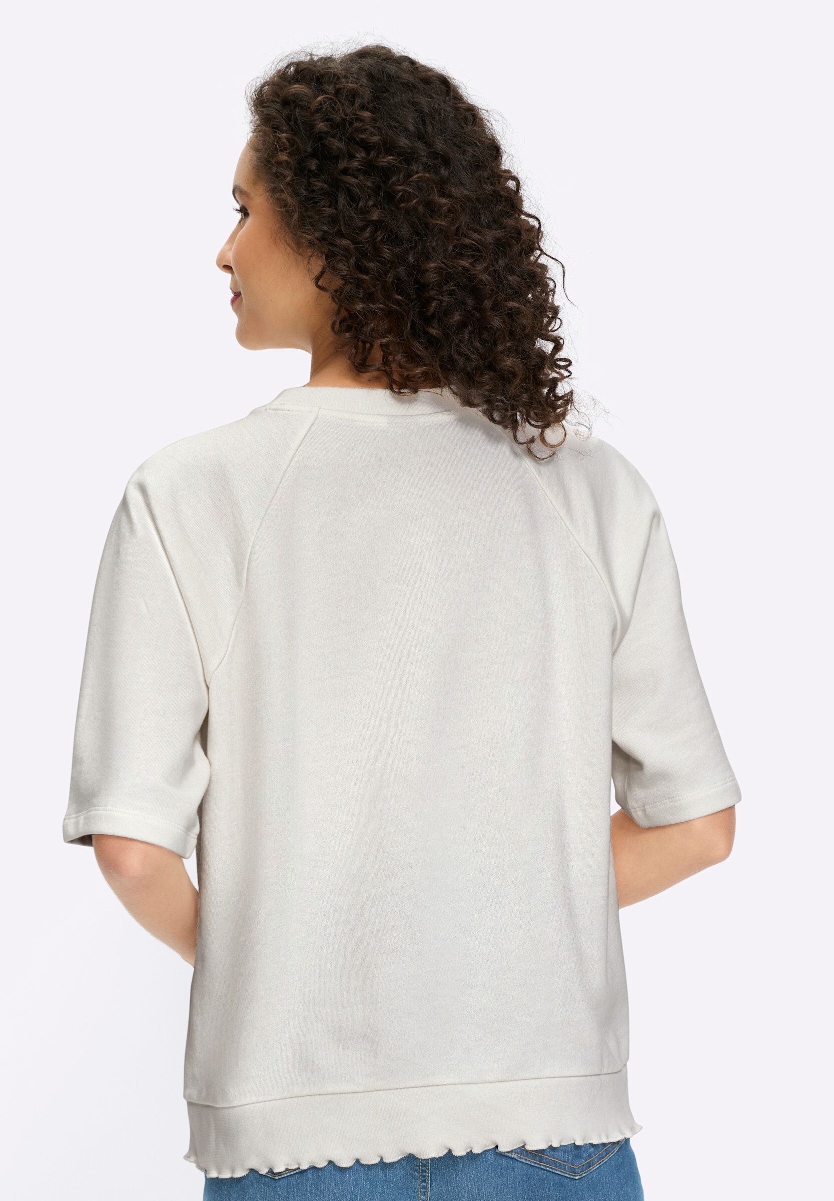 heine Sweatshirt »Sweatshirt Sweatshirt mit Rüschensaum«

