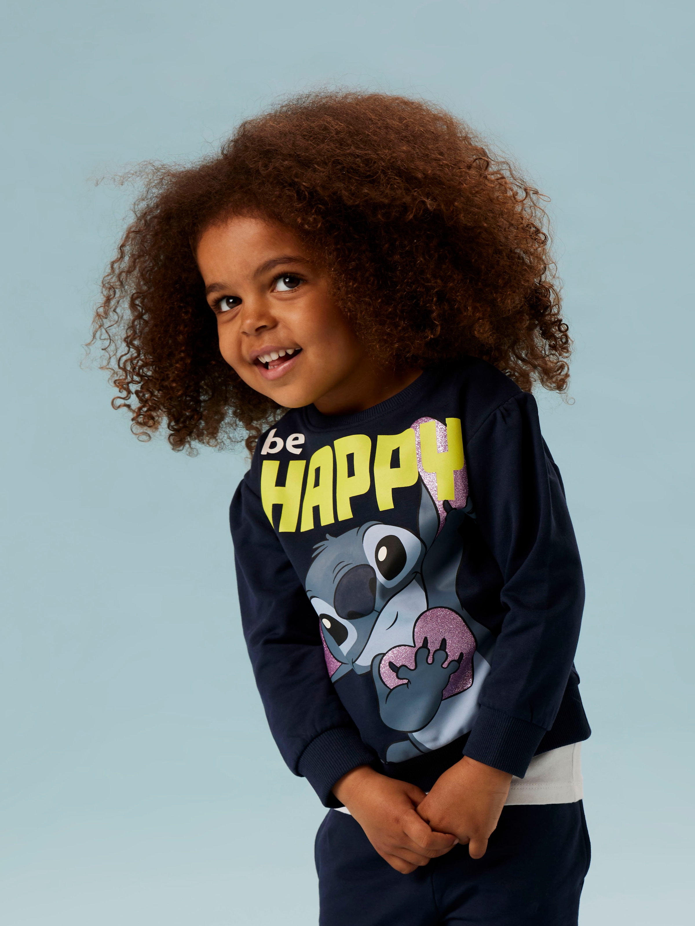 Name It Sweatshirt »NMFDIDI STITCH SWEAT UNB NOOS WDI«, mit Glitzerprint für einen funkelnden und coolen Loo
