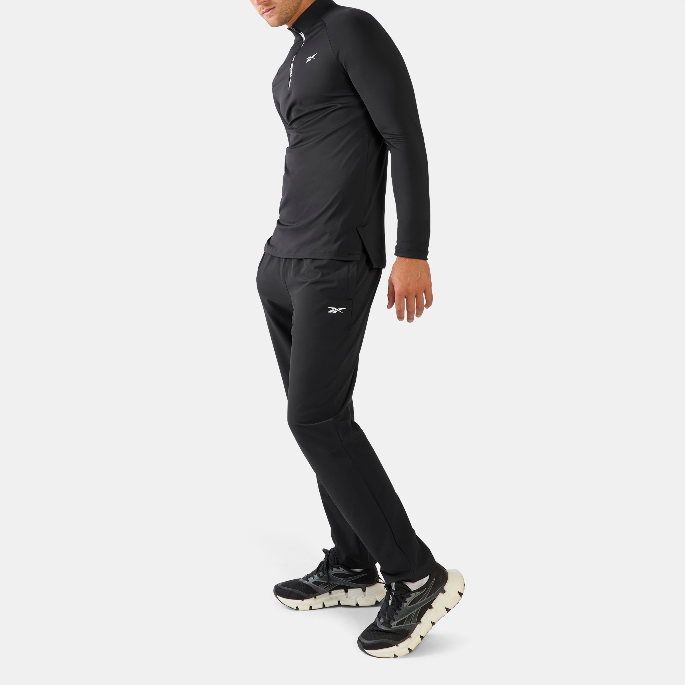 Reebok Trainingsshirt »ID RBK TRAINING 1/4 ZIP« mit Rundhalsausschnitt, aus Polyester und Elasthan, in normaler Länge