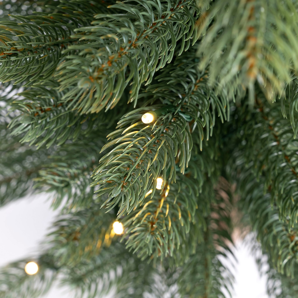 IC Winterworld Künstlicher Weihnachtsbaum »LED-Tannenbaum, künstlicher Christbaum, Höhe ca. 60 cm«, Nordmanntanne, Weihnachtsdeko mit Jutebeutel um den Betonfuß, Batteriebetrieb