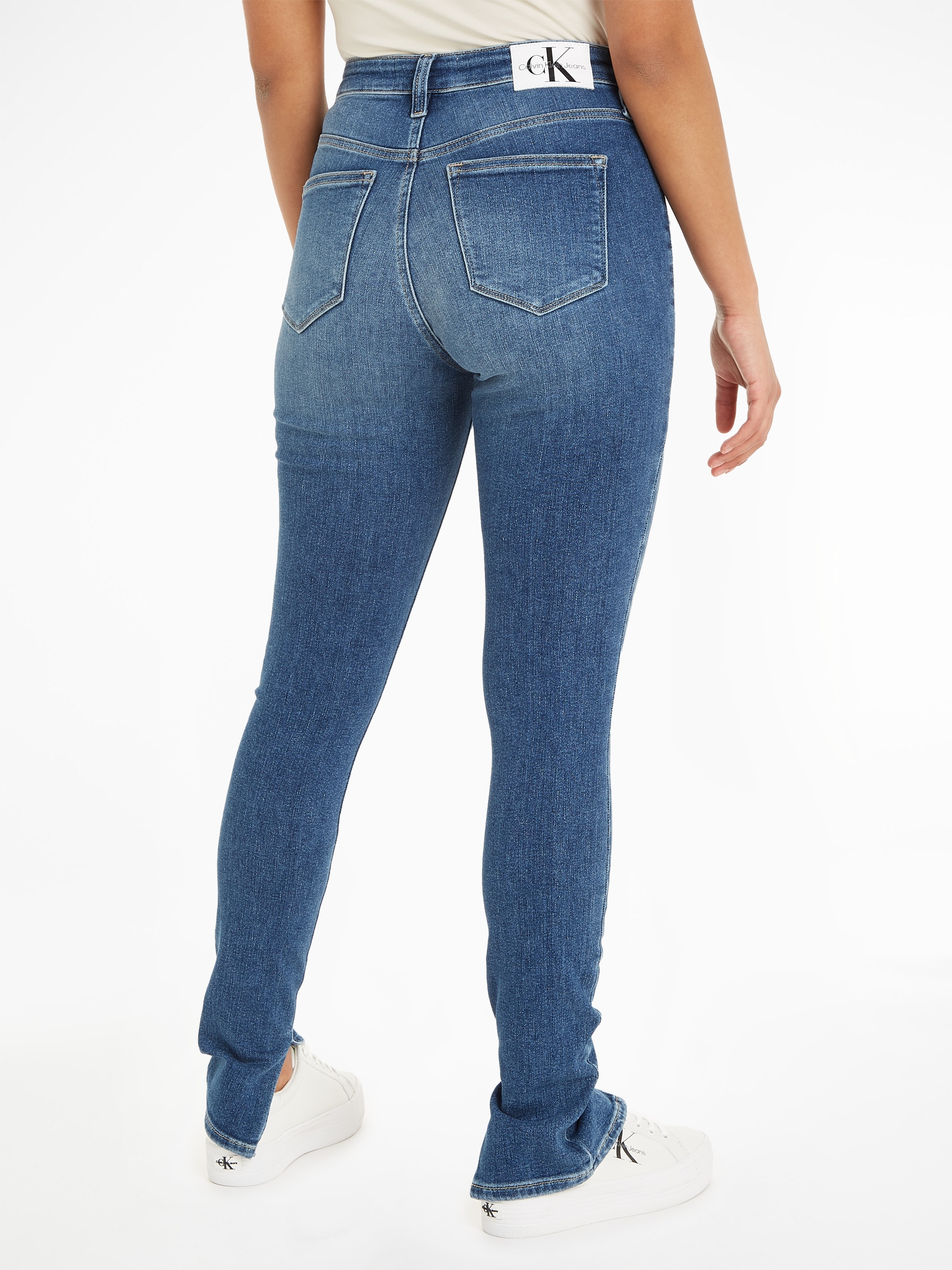 Jeans mit Klein Calvin Calvin SUPER »HIGH am ANKLE«, RISE Klein bei OTTO Bundabschluss Skinny-fit-Jeans Jeans hinteren SKINNY Leder-Badge