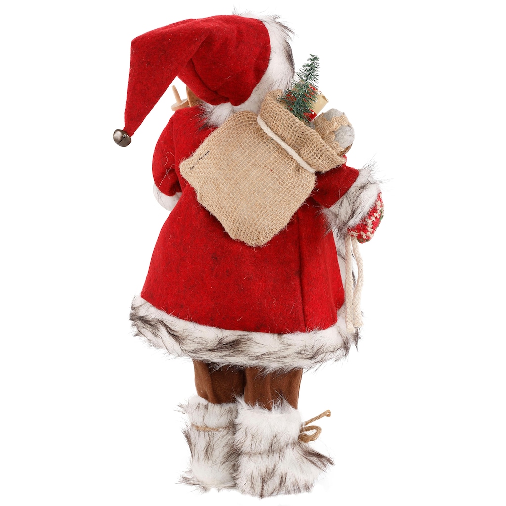 HOSSNER - HOMECOLLECTION Weihnachtsmann »Santa mit Skiern unter dem Arm und Geschenken«