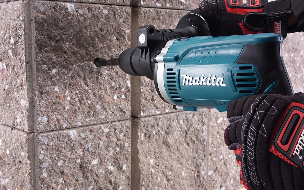 Makita Schlagbohrmaschine »HP1631KX3«, inkl. 74-tlg. Zubehörset und Aufbewahrungskoffer