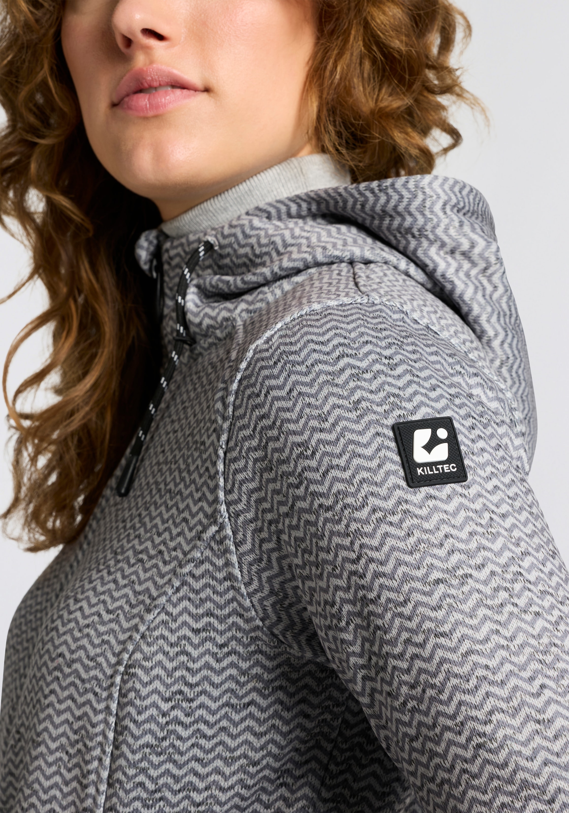 Killtec Strickfleecejacke »KOW 5 WMN KNTFLC JCKT« 1 Stk. tlg. mit verstellbarer Kapuze, mit Seitentaschen mit Zipper