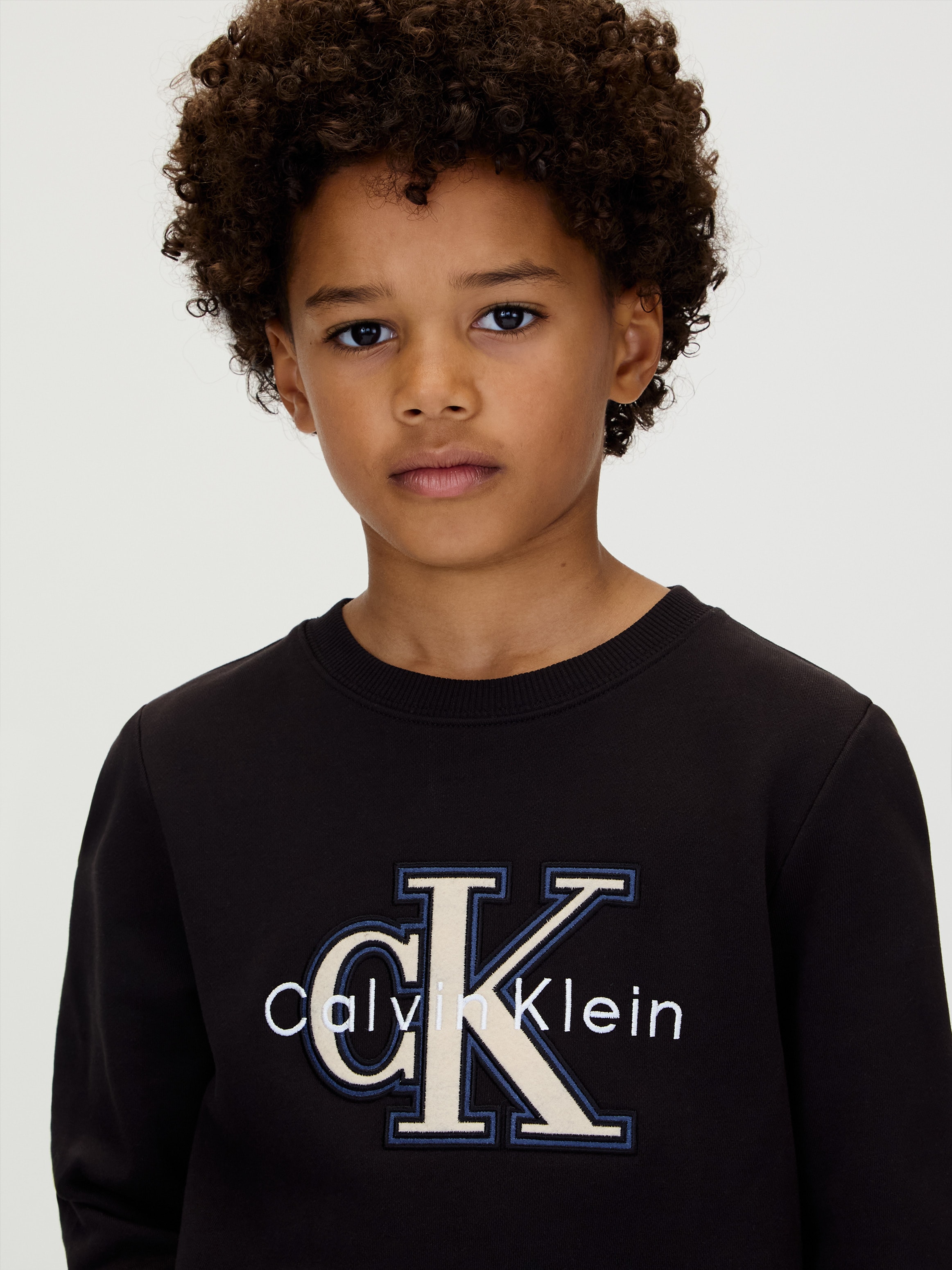 Calvin Klein Jeans Sweatshirt »FESTIVE MONO SWEATSHIRT«, für Kinder bis 16 Jahre, Applikation