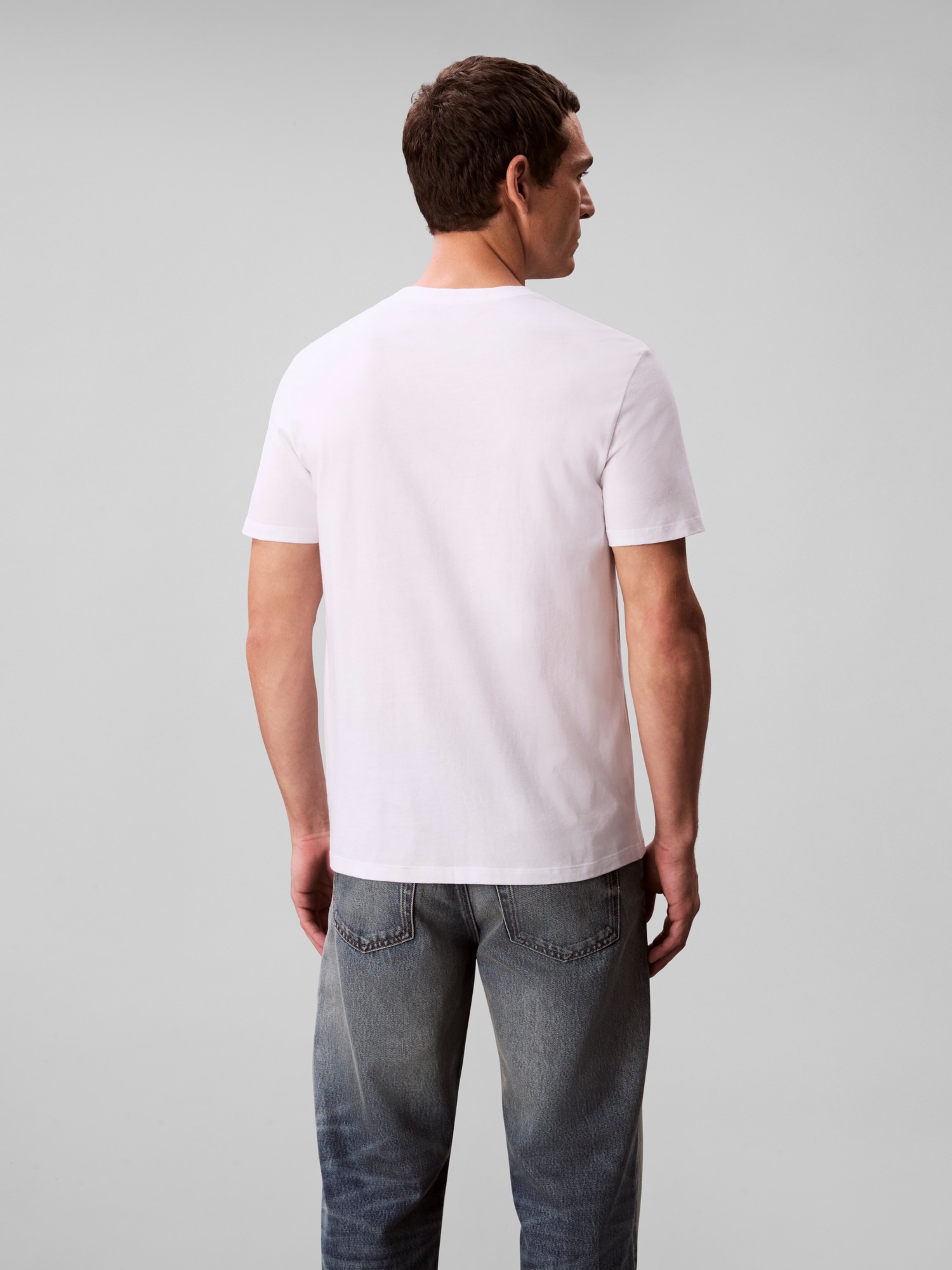 Calvin Klein Jeans T-Shirt »SS 30S EU CK CALVIN GRAPHIC TEE«, Mit Rundhalsausschnitt, regular fit