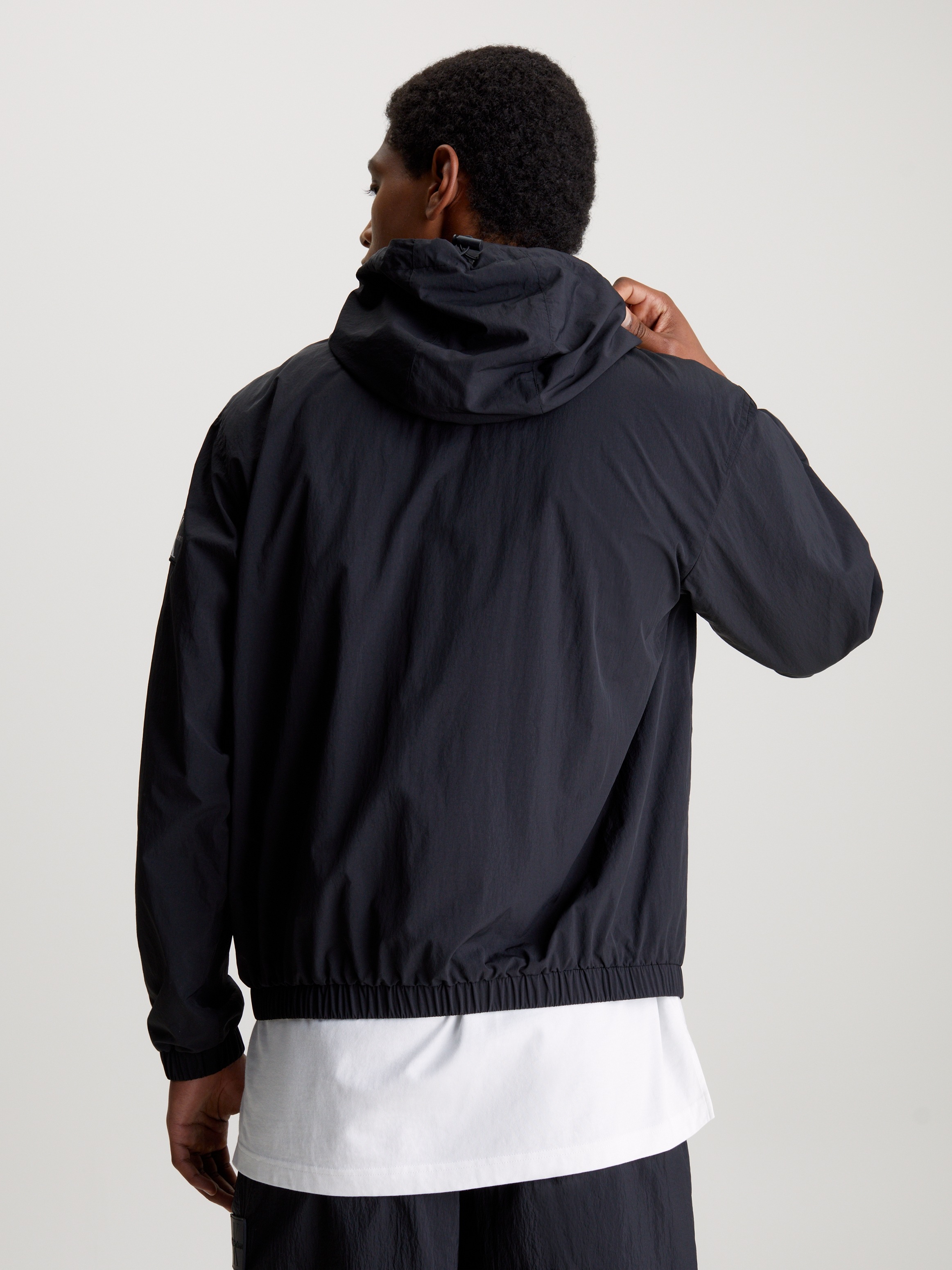 Calvin Klein Jeans Windbreaker »WINDBREAKER«, mit Kapuze, mit Calvin Klein Logo-Badge