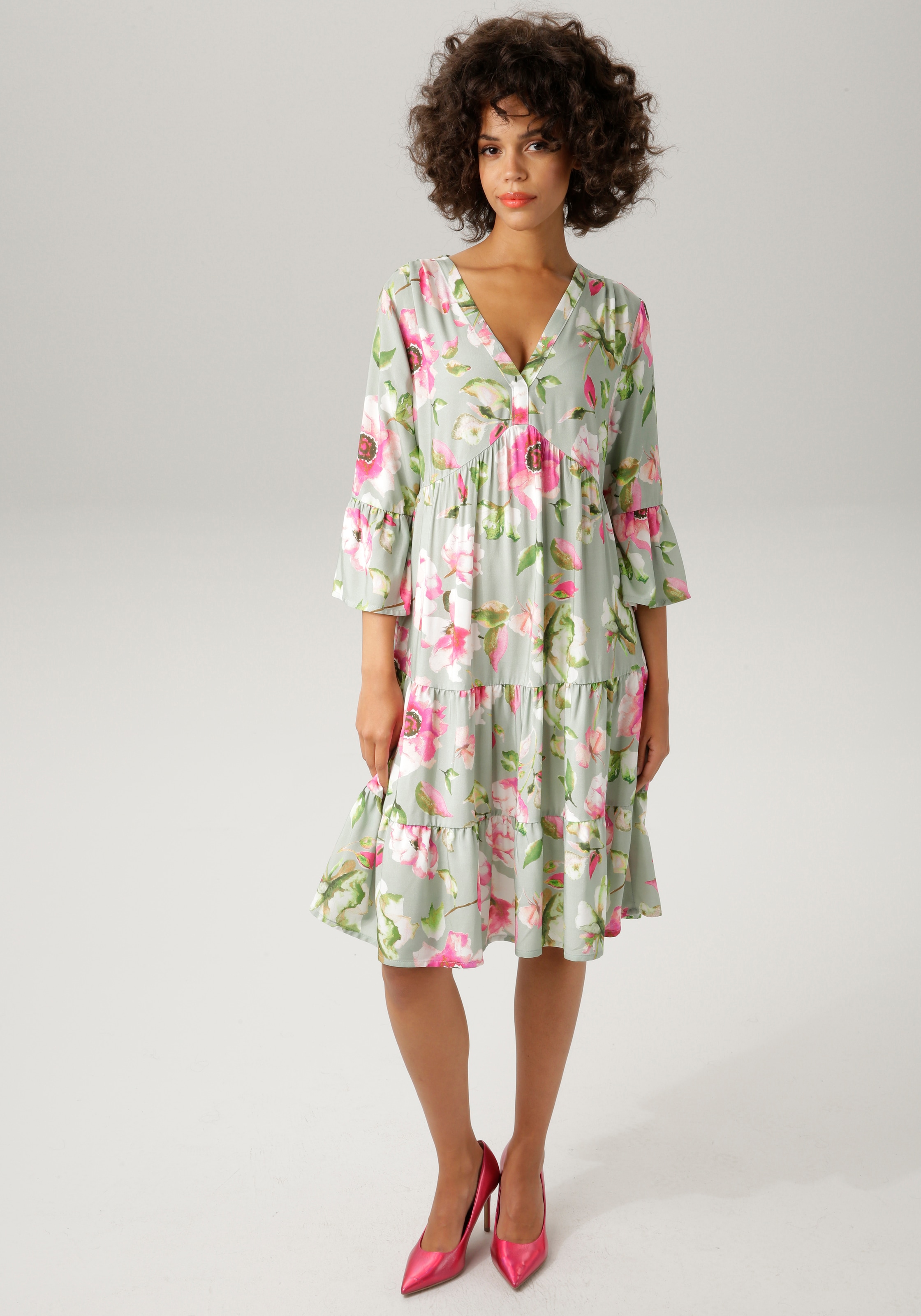 bei OTTO fantasievollem mit kaufen Aniston CASUAL Tunikakleid, online Blumendruck