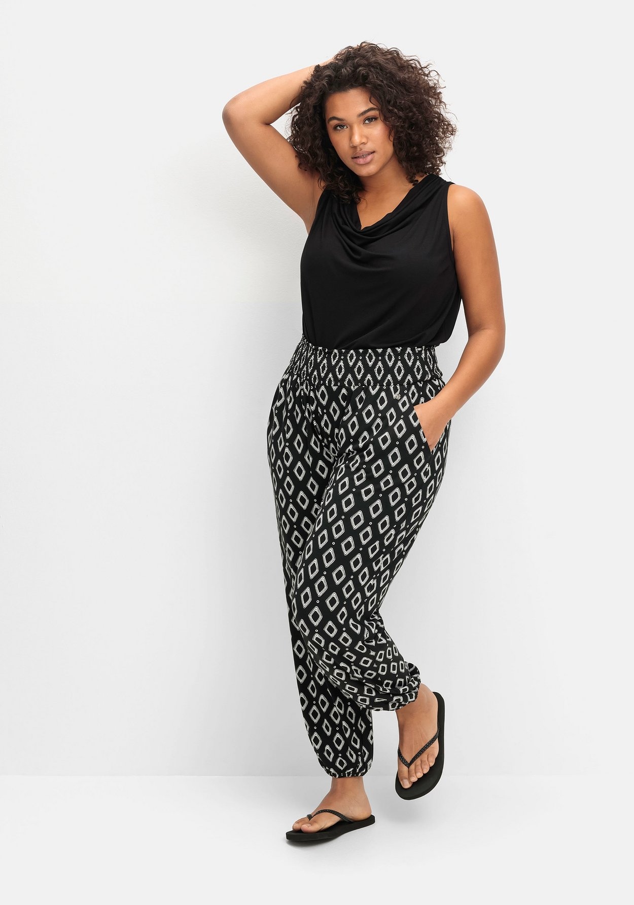 Sheego Schlupfhose »Jerseyhose mit seitlichen Eingriffstaschen«