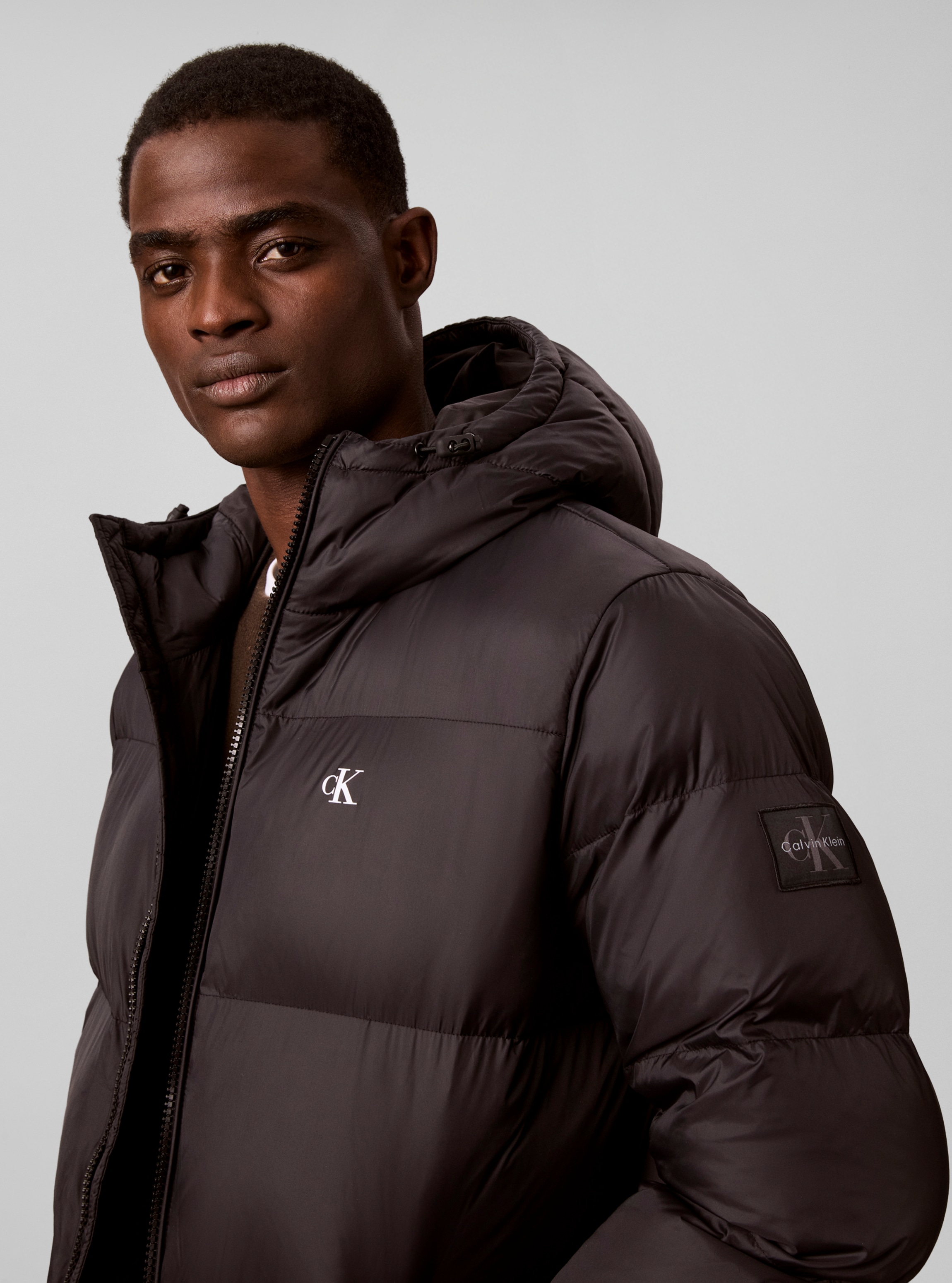 Calvin Klein Jeans Steppmantel »LONG LENGTH HOODED NYLON« Regular fit mit Eingrifftaschen