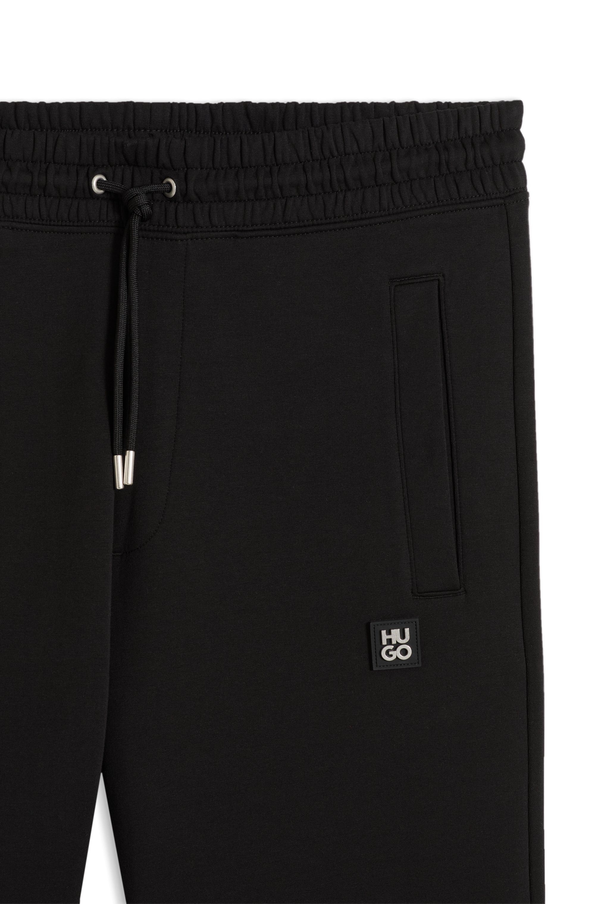 HUGO Sweathose »Dimacs Metal Logo«  elastischer Bund mit Kordel, Relaxed Fit, Premium Interlock