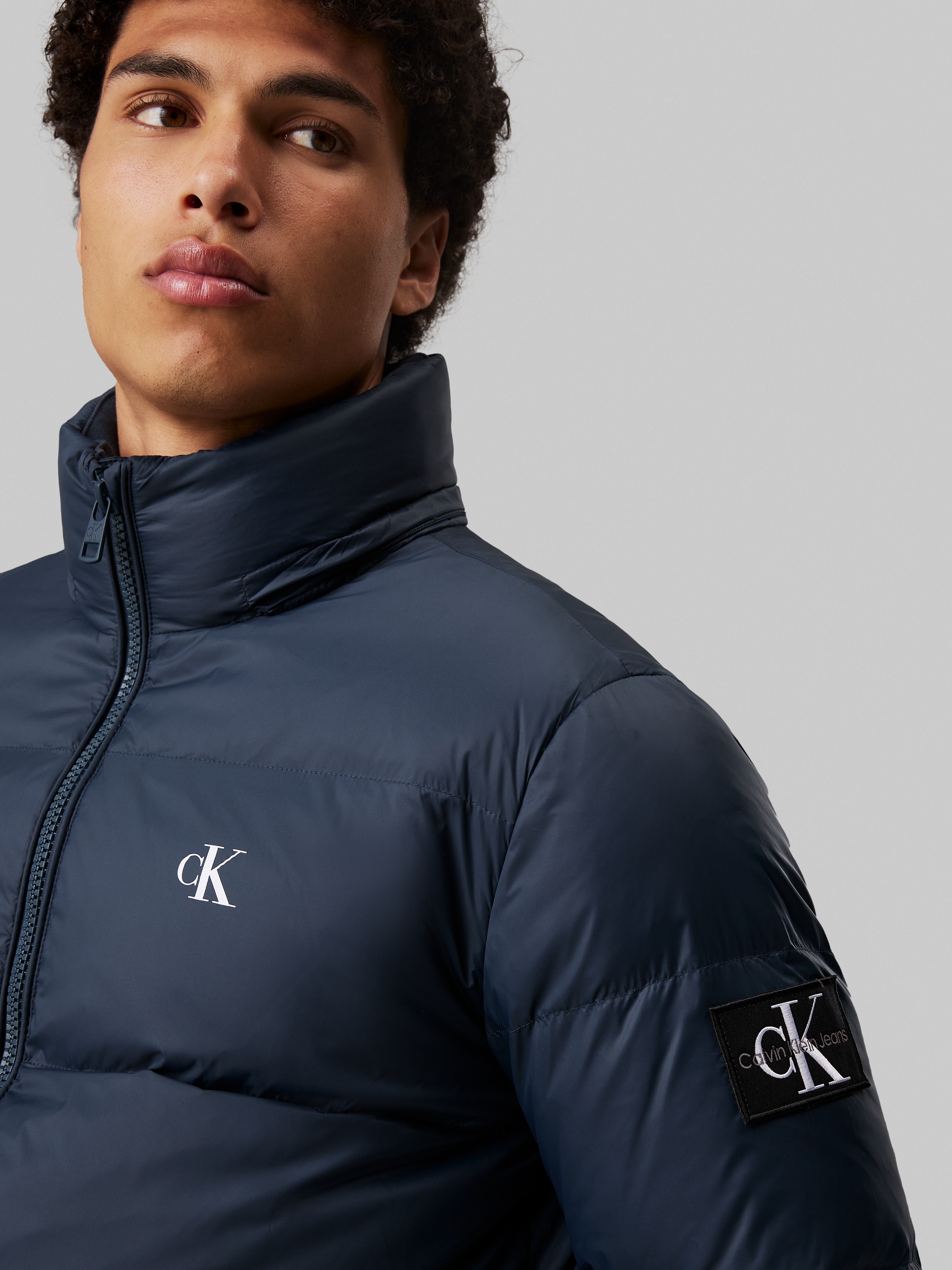 Calvin Klein Jeans Outdoorjacke »ESSENTIALS DOWN JACKET«, mit Kapuze, mit Logoprägung