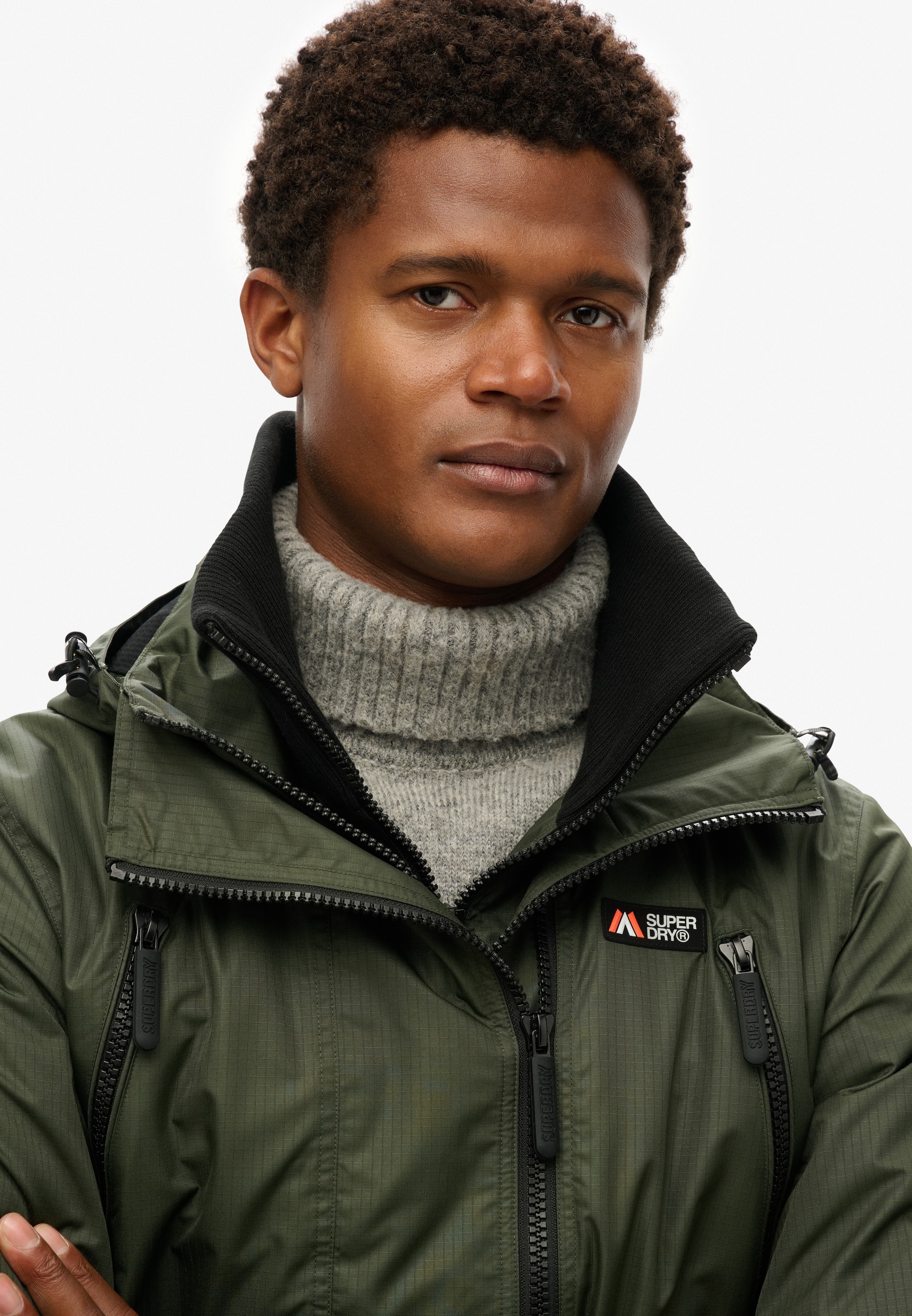 Superdry Outdoorjacke »HOODED MTN WINDBREAKER JACKET«, mit Kapuze