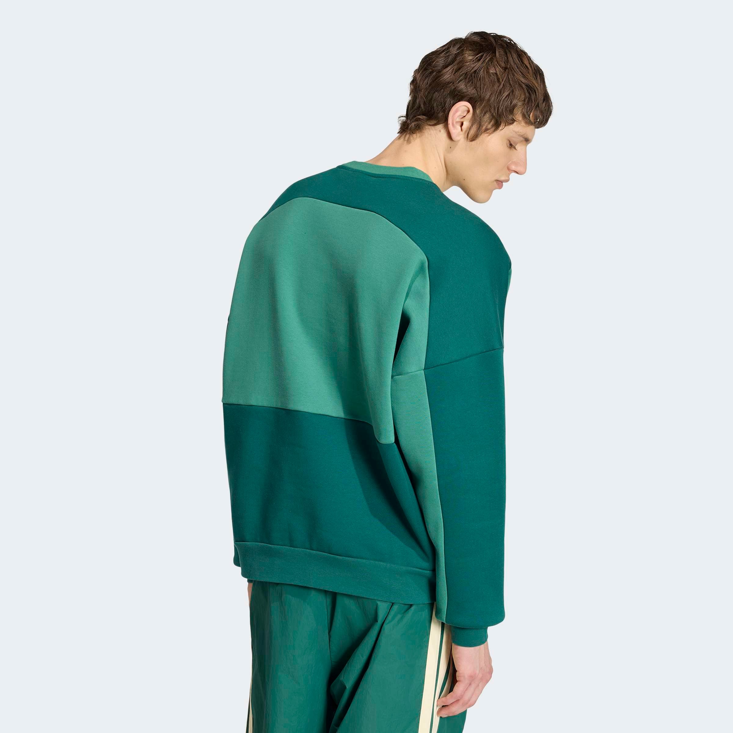 adidas Originals Sweatshirt »MUNICH 93 RUNDHALS«, mit angesetzten Bündchen an Ärmel- und Rumpfabschluss
