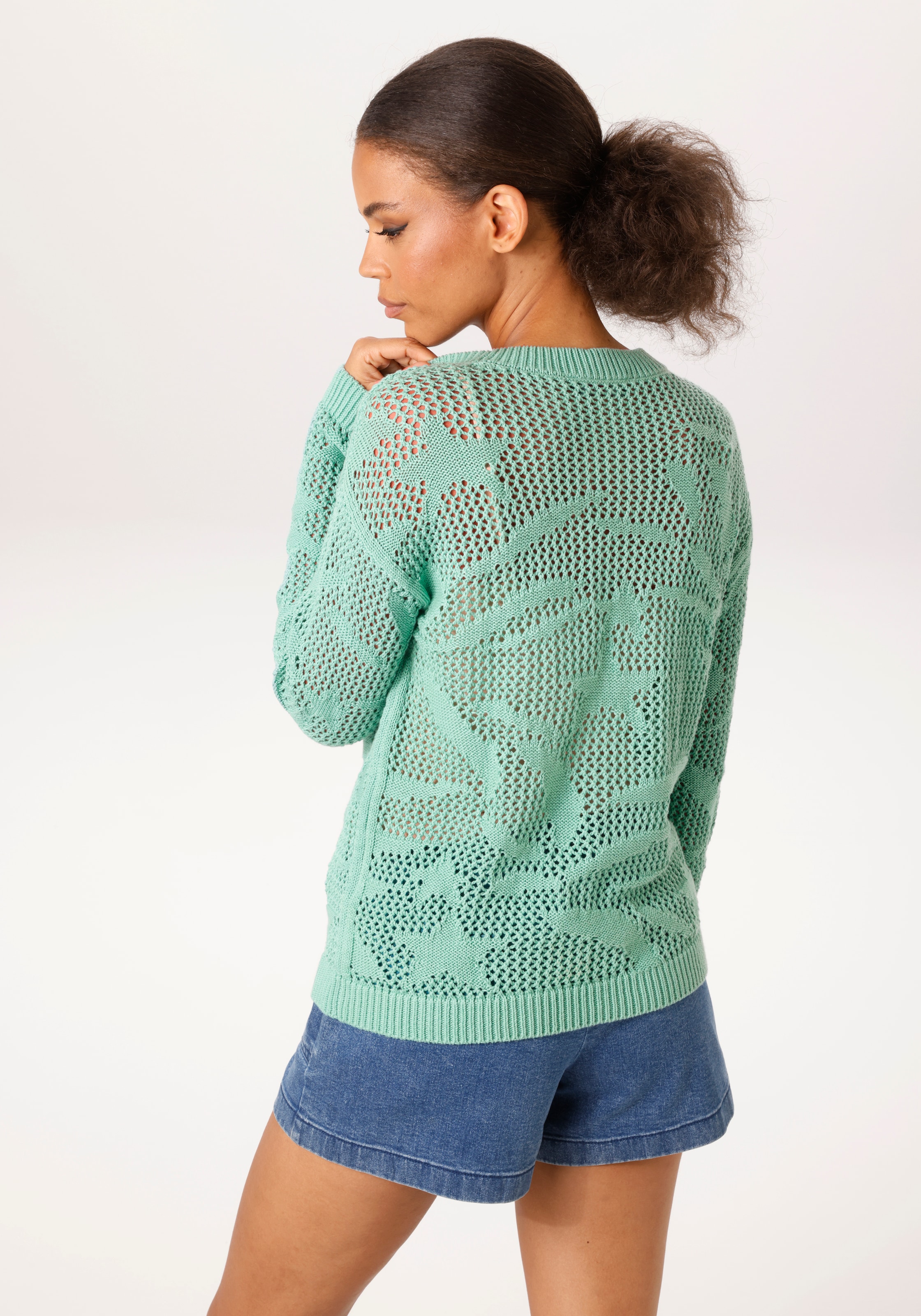 Aniston CASUAL Strickpullover im trendigen Ajour-Muster mit eingestrickten Motiven