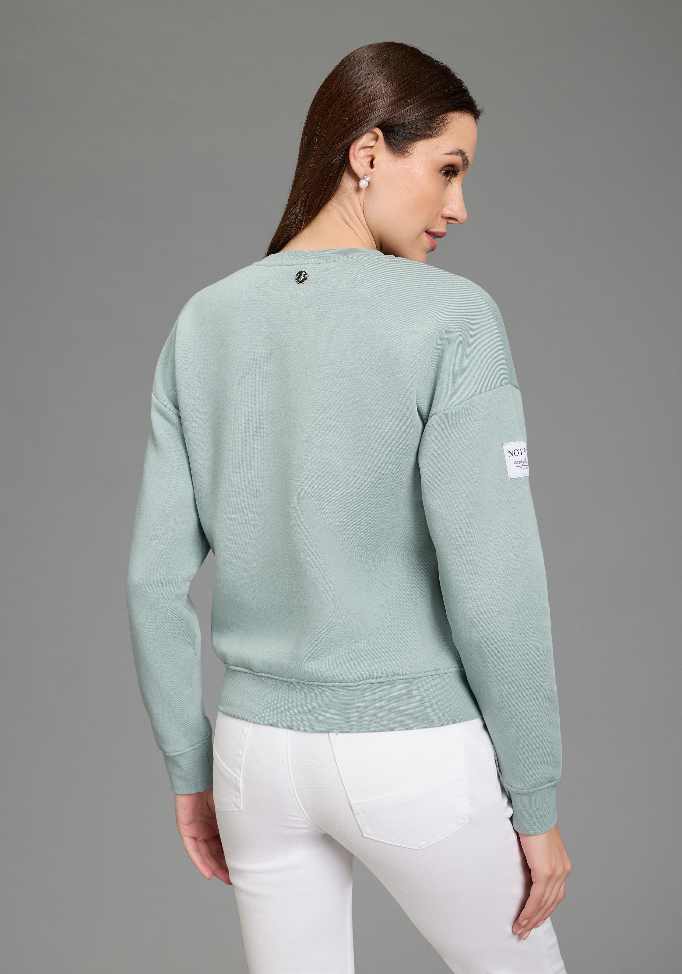 Bruno Banani Sweatshirt , mit Rundhalsausschnitt und platzierten Weblabels
