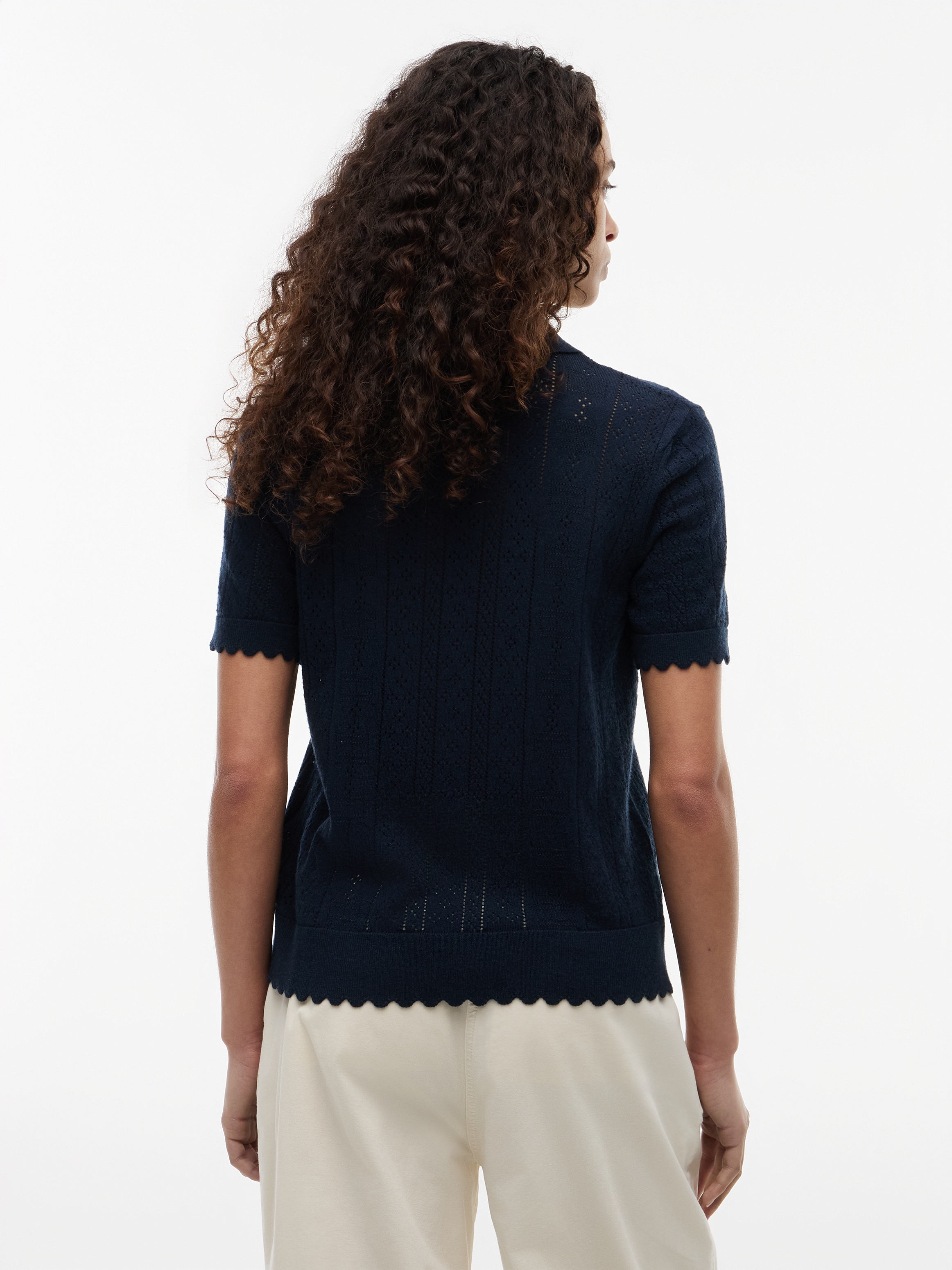 Tommy Jeans Kurzarmpullover »TJW POINTELLE POLO SWEATER« Viskosemischung, Pointelle Strickmuster, gewellte Säume
