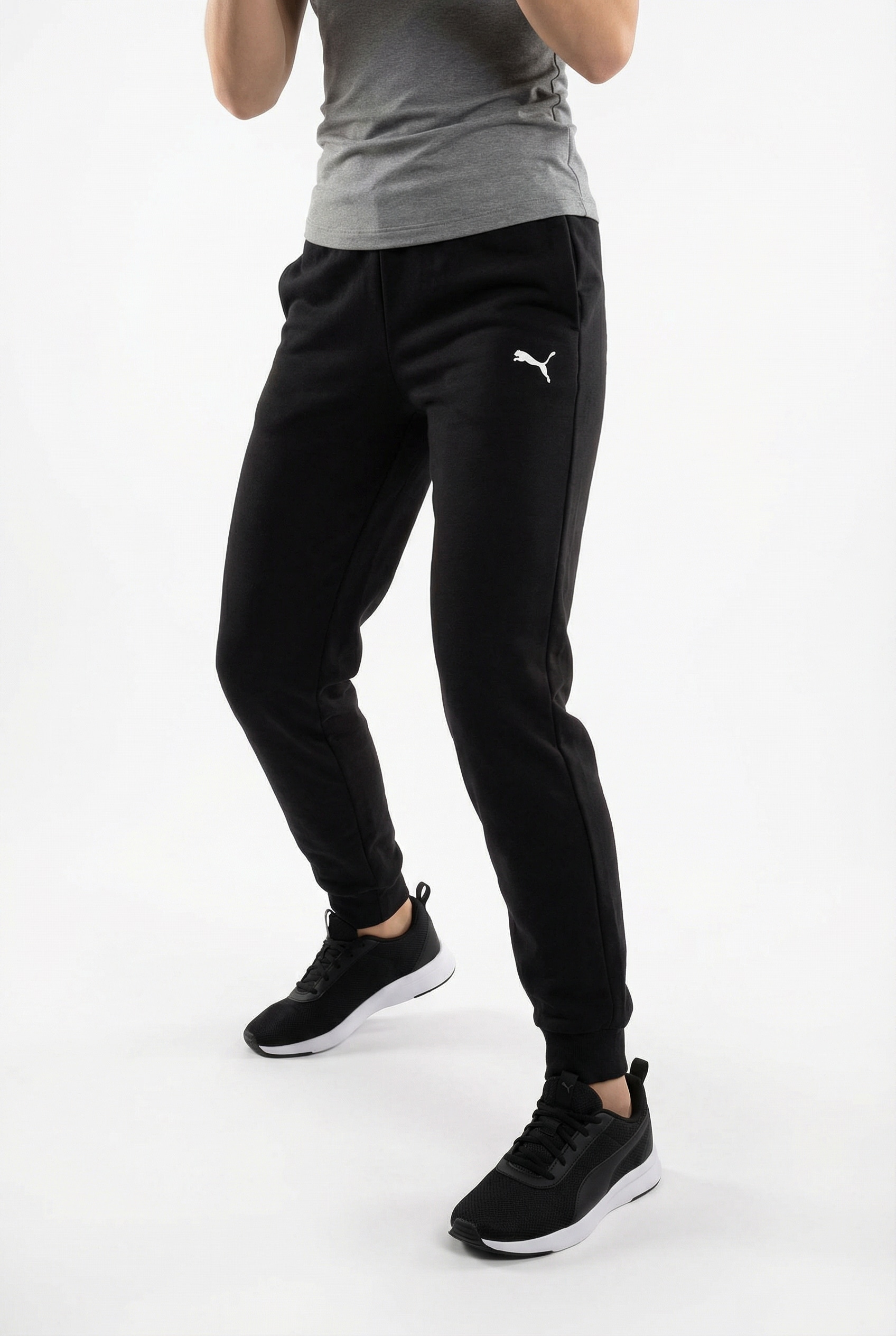 PUMA Trainingshose »ESS SWEATPANTS CL FL G«  aus Fleece-Material, mit geripptem Bund und Kordelzug