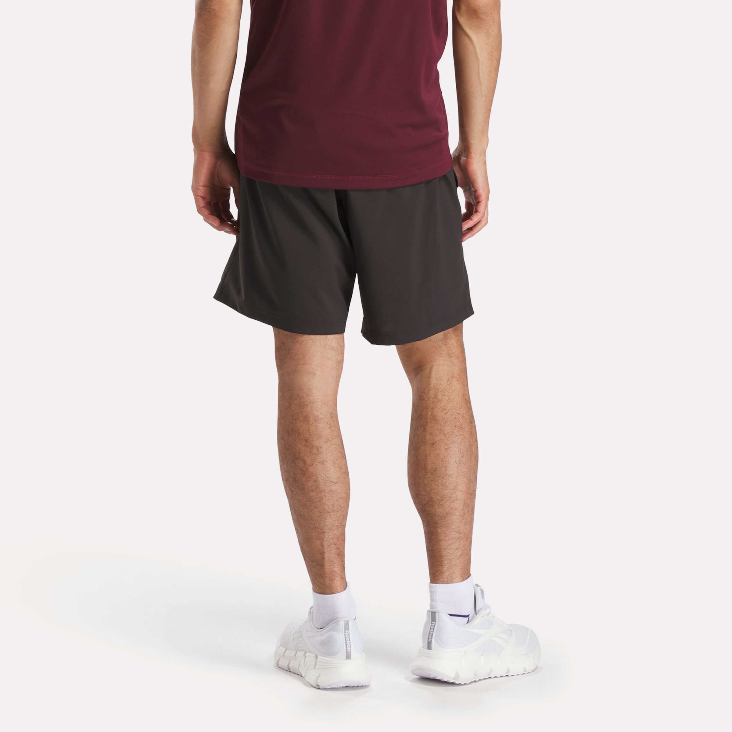 Reebok Trainingsshorts »WOR WOVEN SHORT«  kurze Trainingsshorts, ca. Mitte Oberschenkel geschnitten