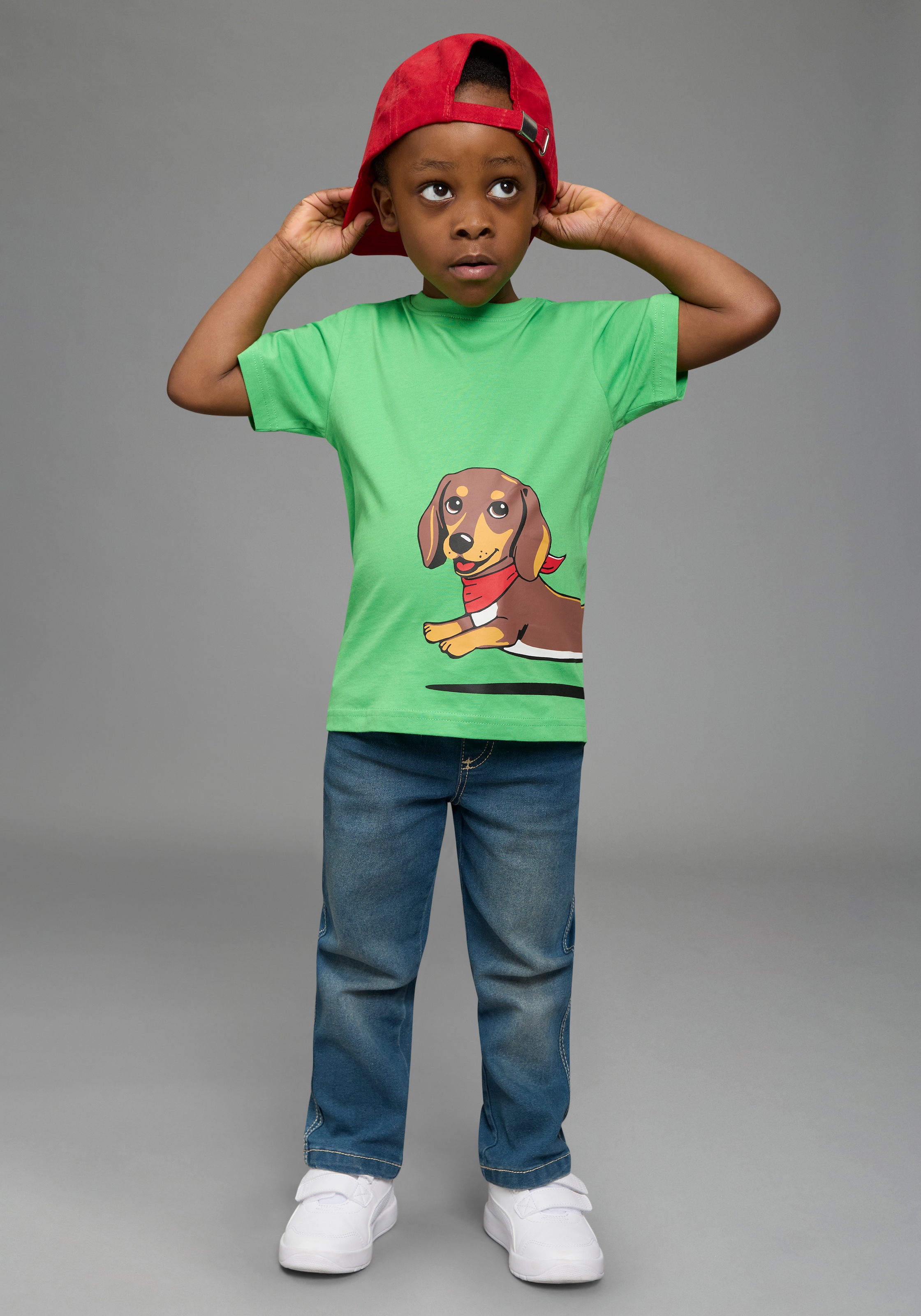 KIDSWORLD T-Shirt »Shirt mit rundum Dackel-Print« Basic Passform, Kurzarm, bedruckte Optik, aus Baumwolle