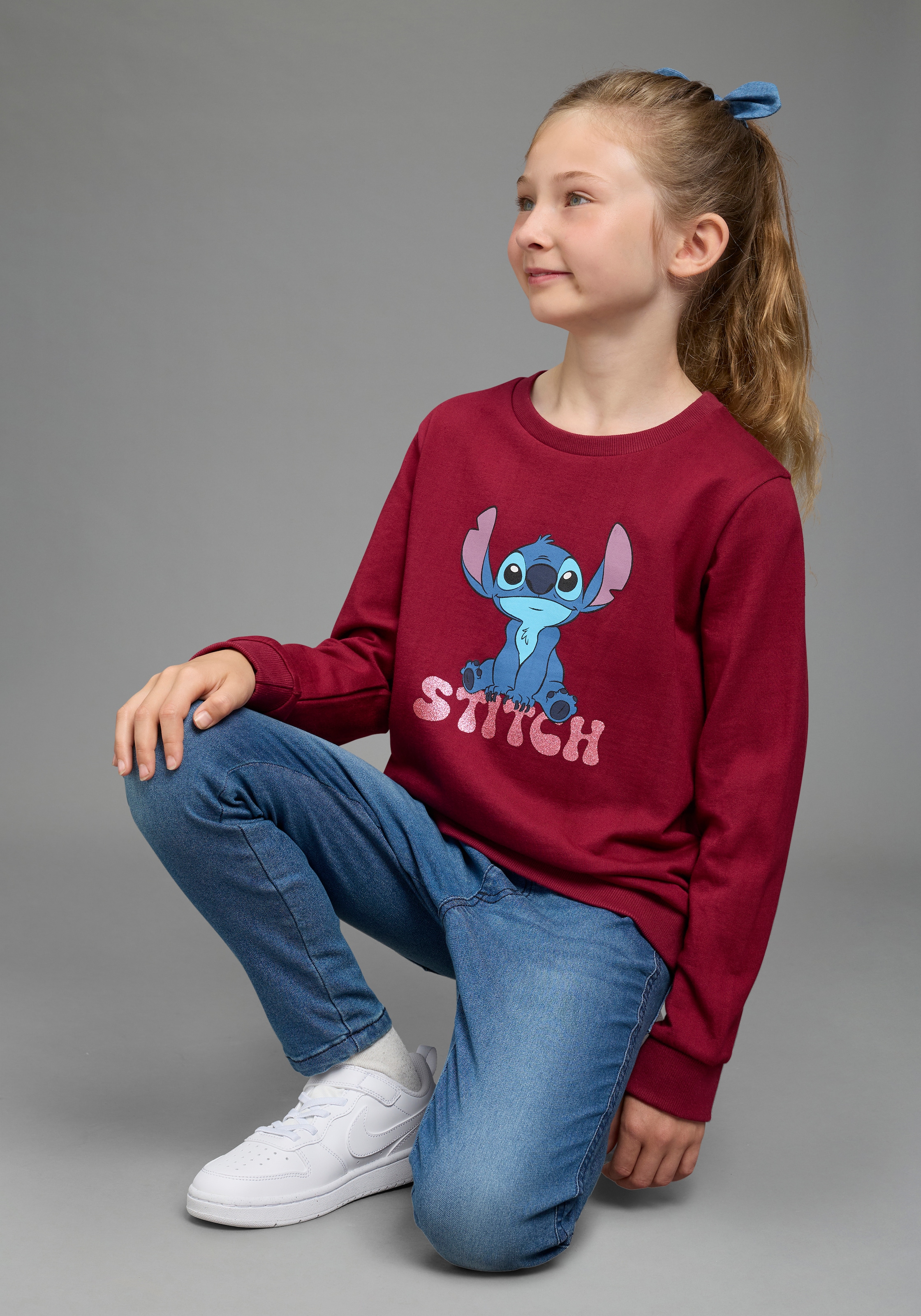 KIDSWORLD Sweatshirt »STITCH Glitzerprint Sweatshirt, Disney«, mit Rundhalsausschnitt, mit Rippbündchen, hüftbedeckende Länge
