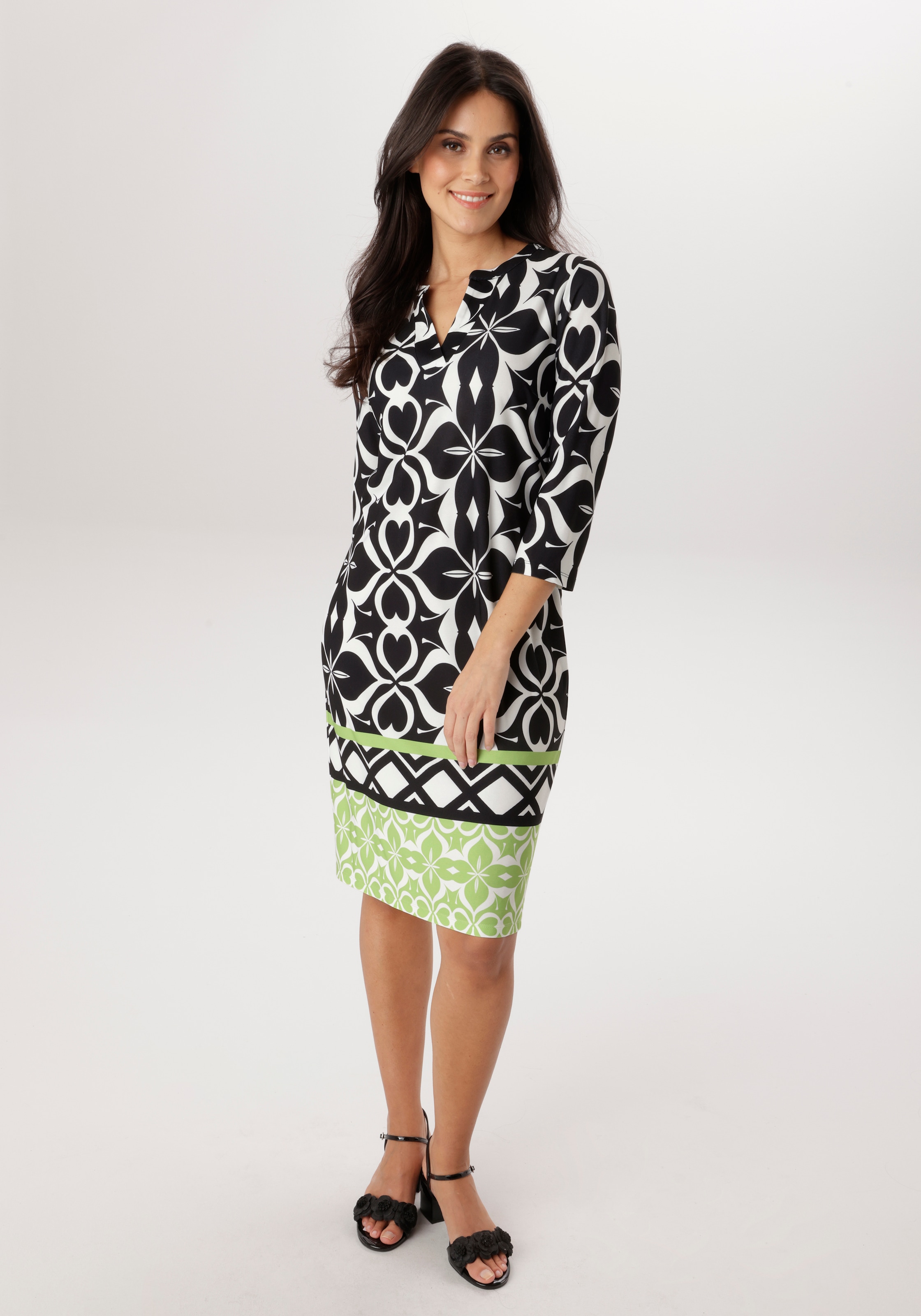 Aniston SELECTED Jerseykleid mit gemusterter Bordüre und grünem Kontrast am Saum - NEUE KOLLEKTION