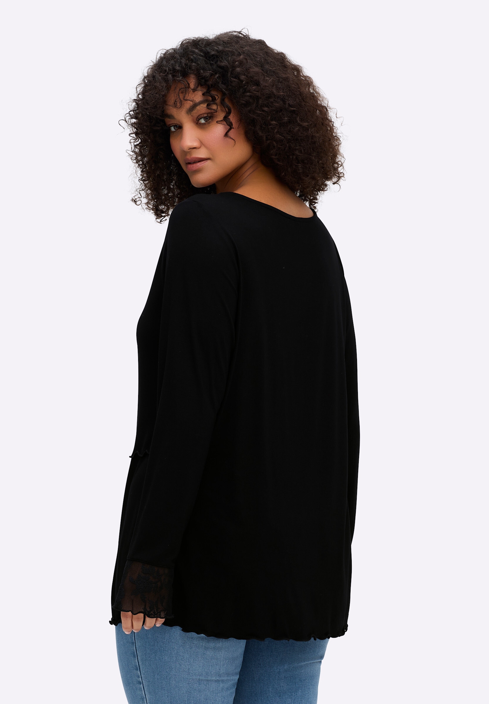 sheego by Joe Browns Sweatshirt »Sweatshirt Langarmshirt mit schräg verlaufenden Kanten«
